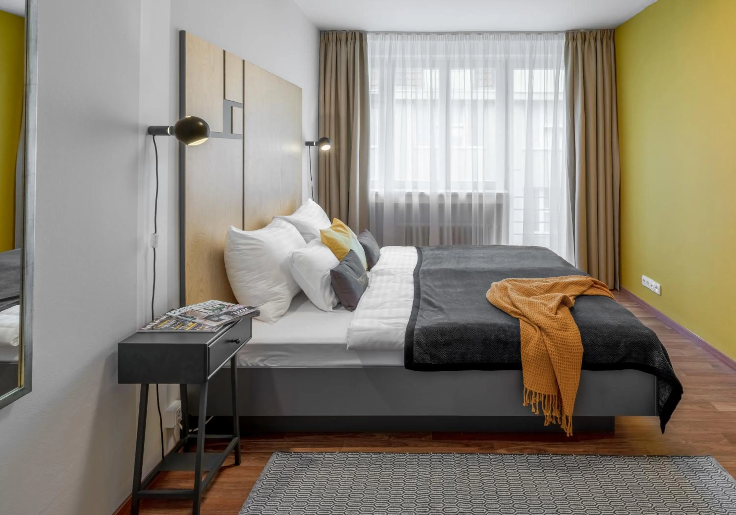 Bed in City Leaf Apartments