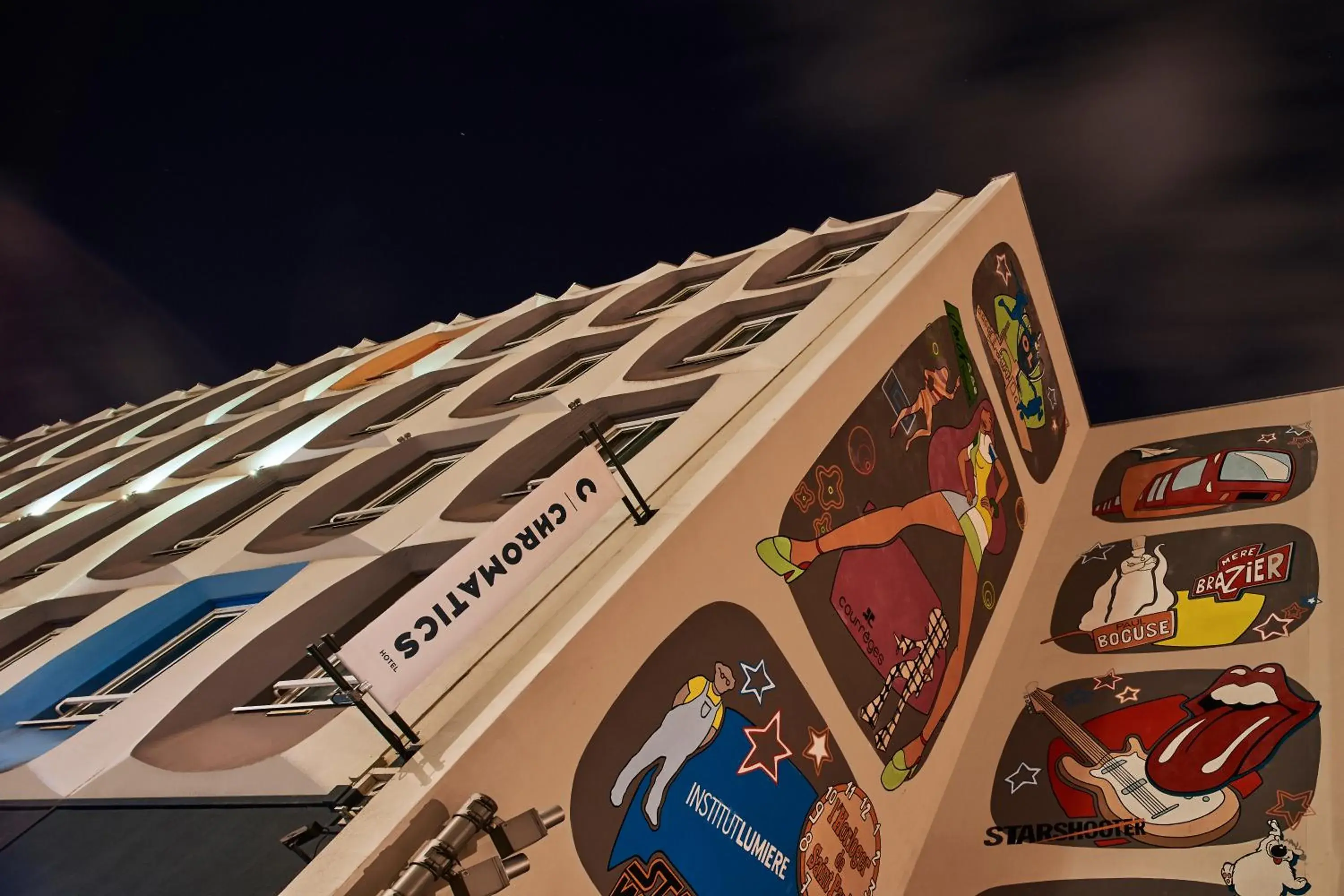 Property building in Hôtel Chromatics & Restaurant Hill Club by HappyCulture Property building in Hôtel Chromatics & Restaurant Hill Club by HappyCulture