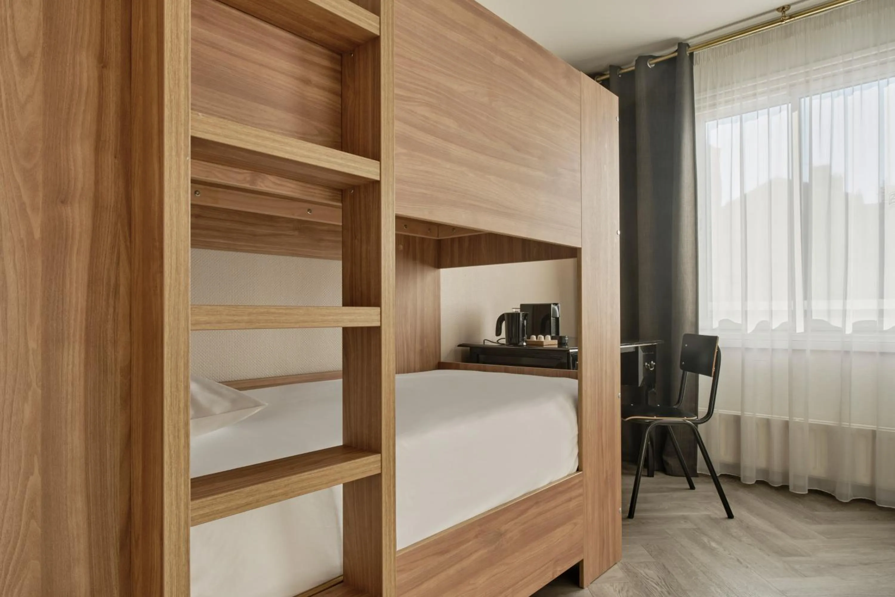 Photo of the whole room, Bed in Hôtel Chromatics & Restaurant Hill Club by HappyCulture