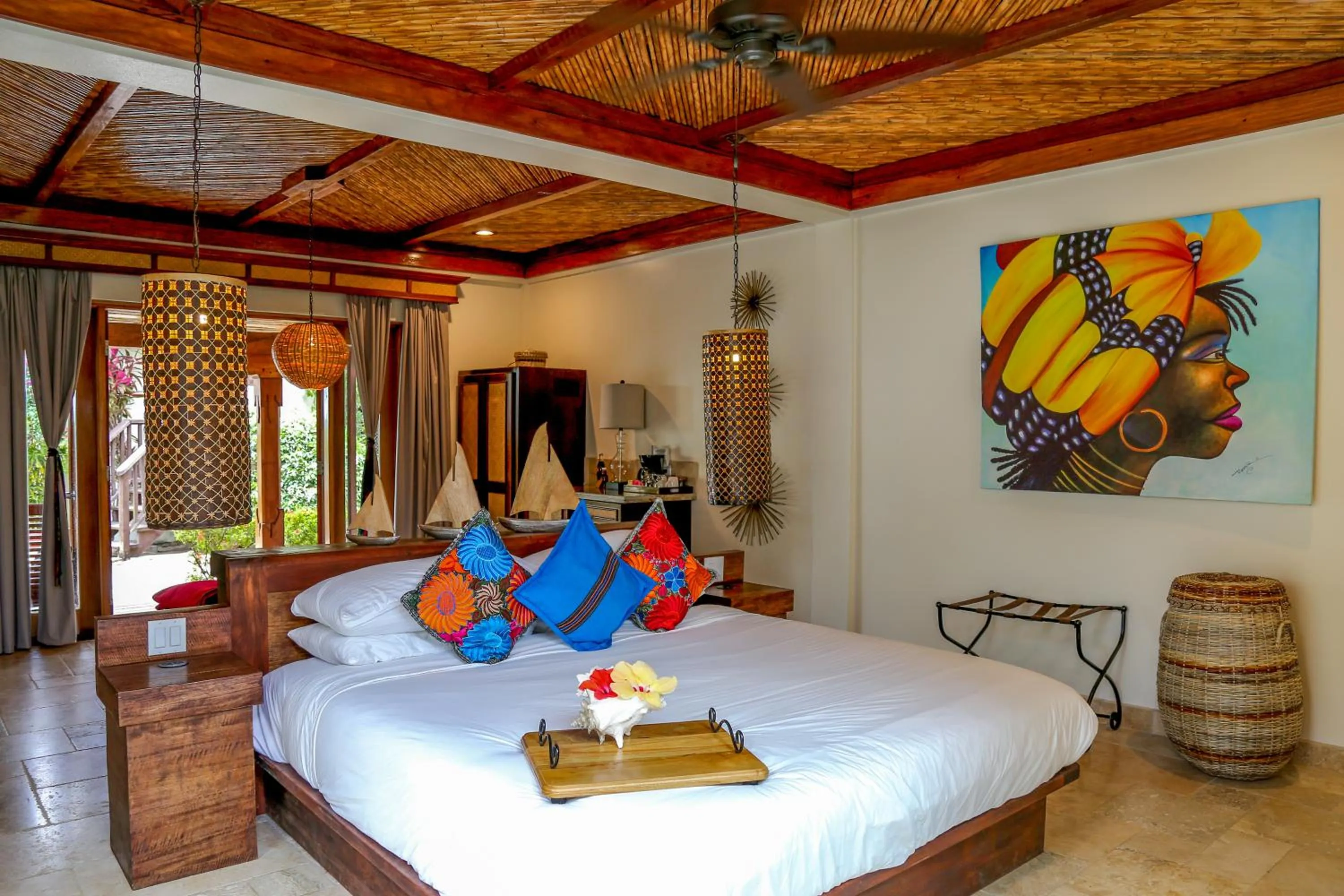 Bed in Almond Beach Resort at Jaguar Reef