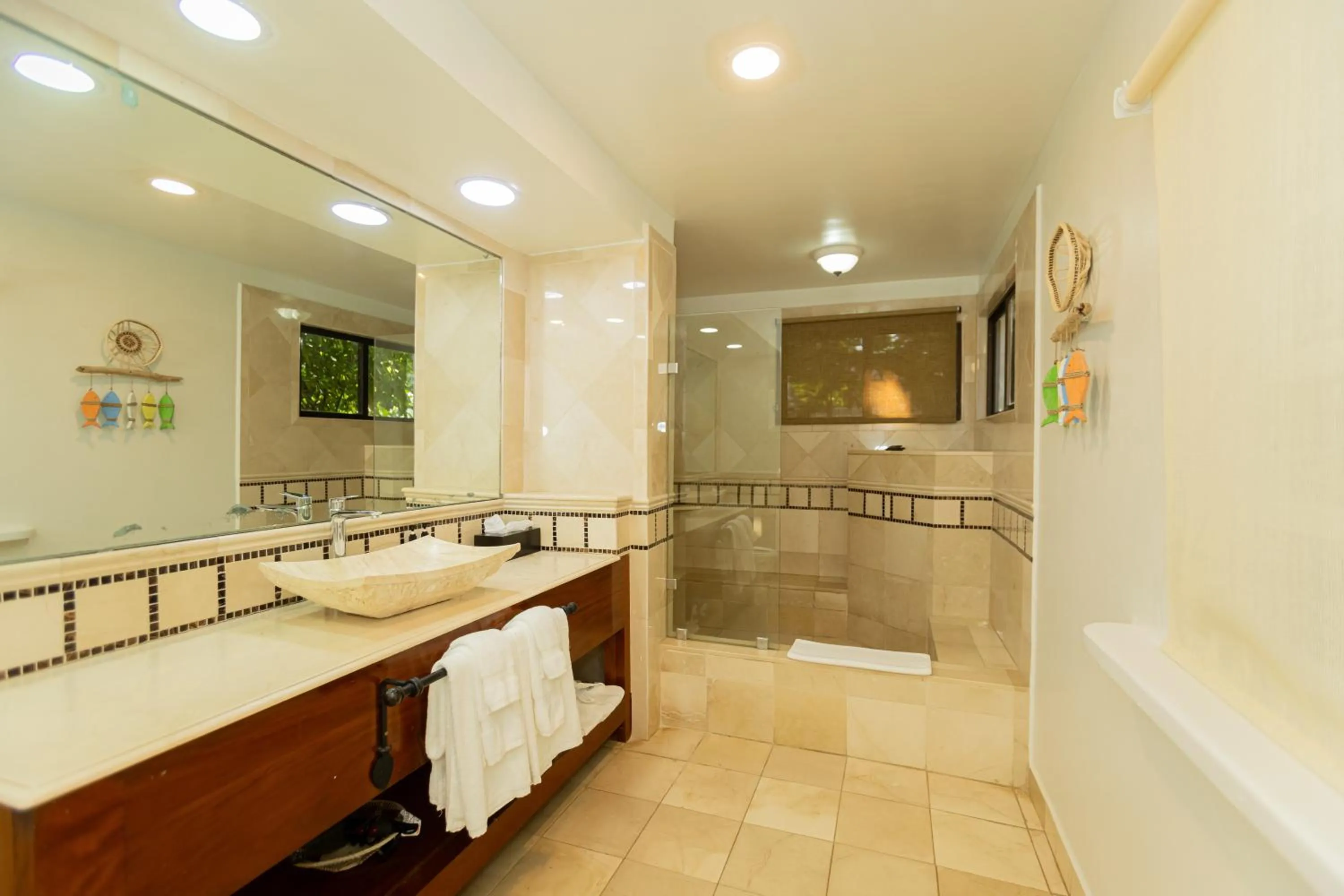 Shower in Almond Beach Resort at Jaguar Reef