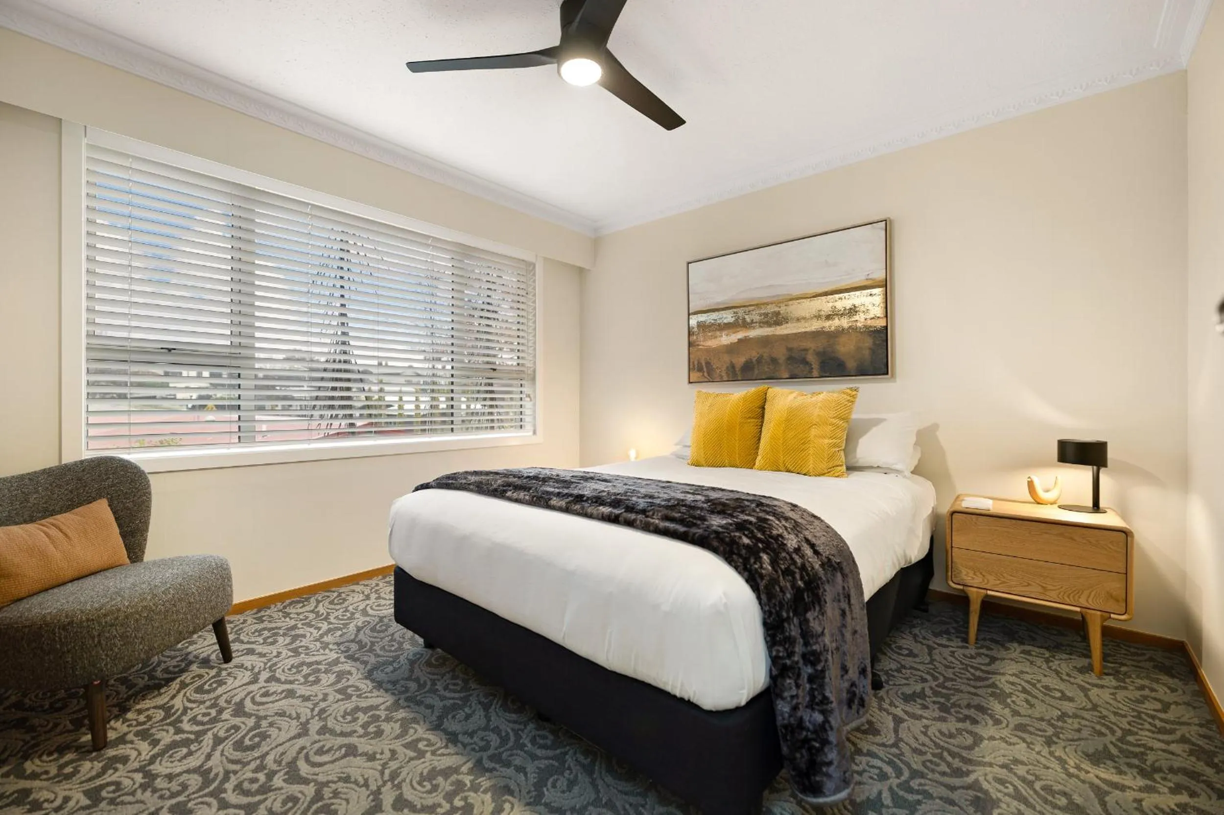 Bed in Arrowtown Motel