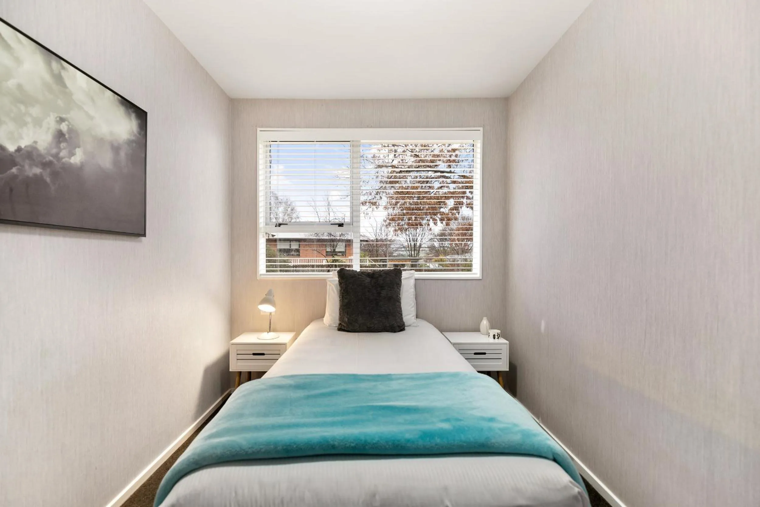 Bed in Arrowtown Motel