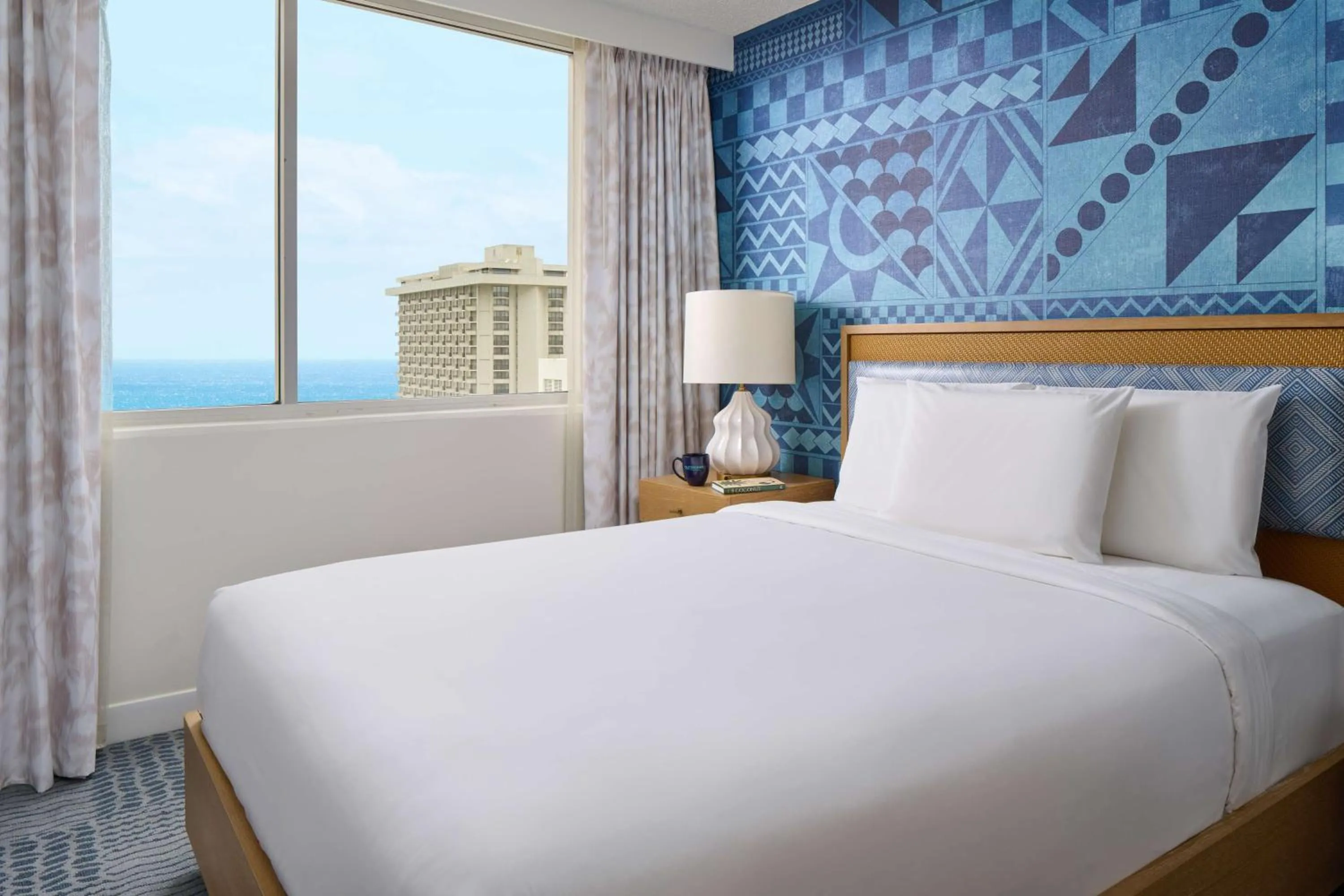 Photo of the whole room, Bed in OUTRIGGER Waikiki Paradise Hotel