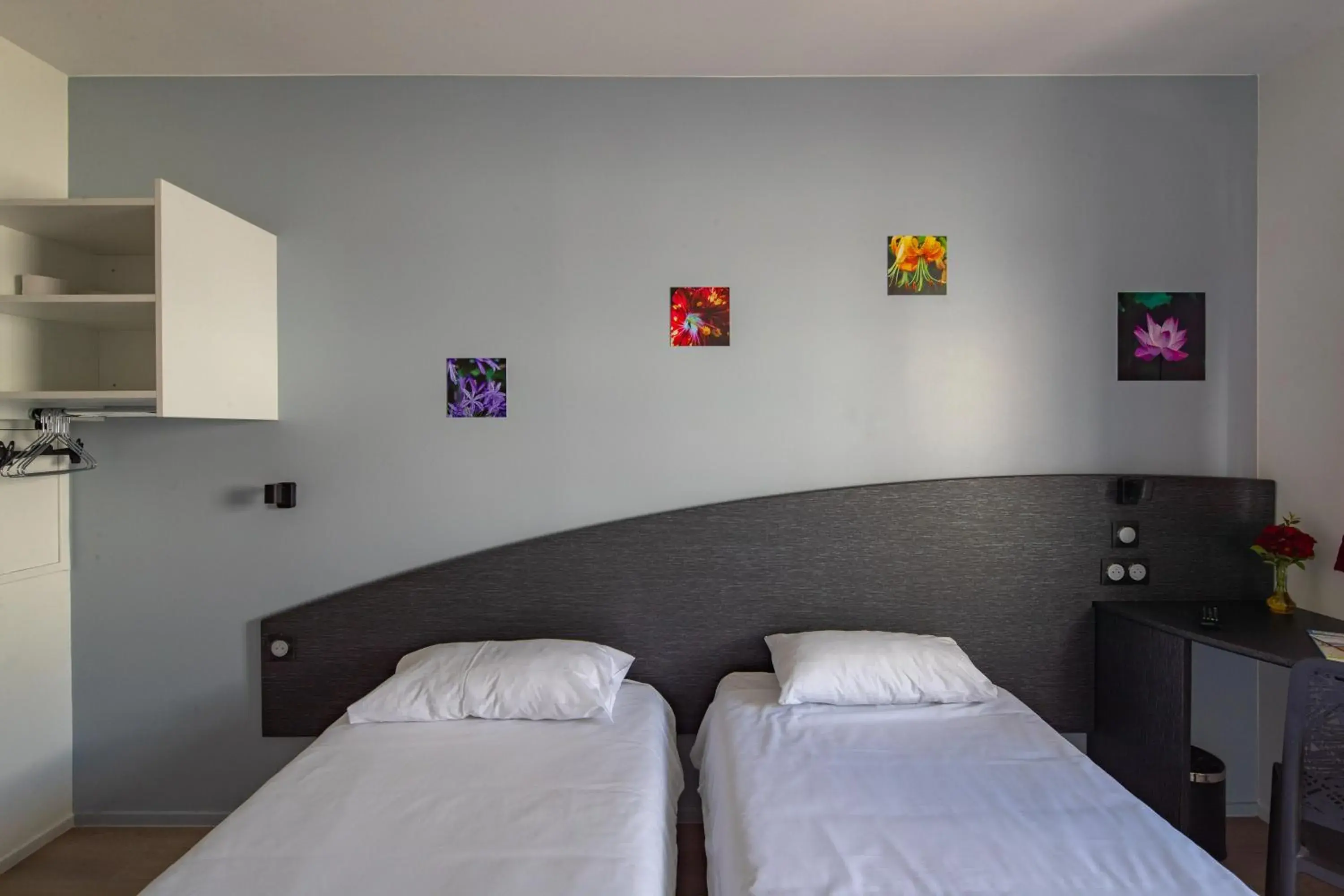 Bed in Hotel CIS Paris Kellermann