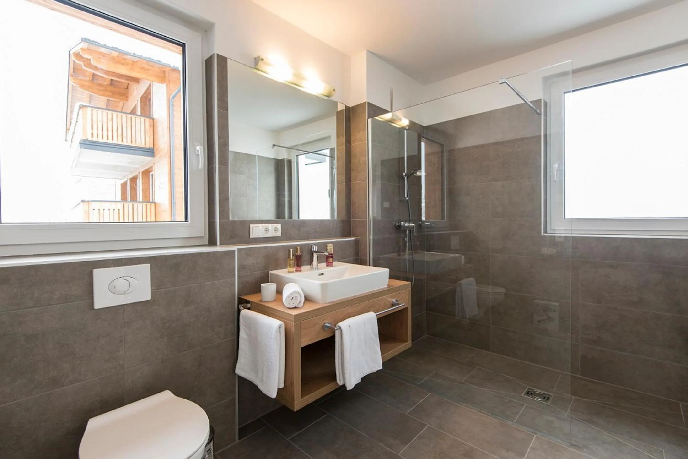 Bathroom in Apartment Dorf Wagrain Alpenleben by AlpenTravel
