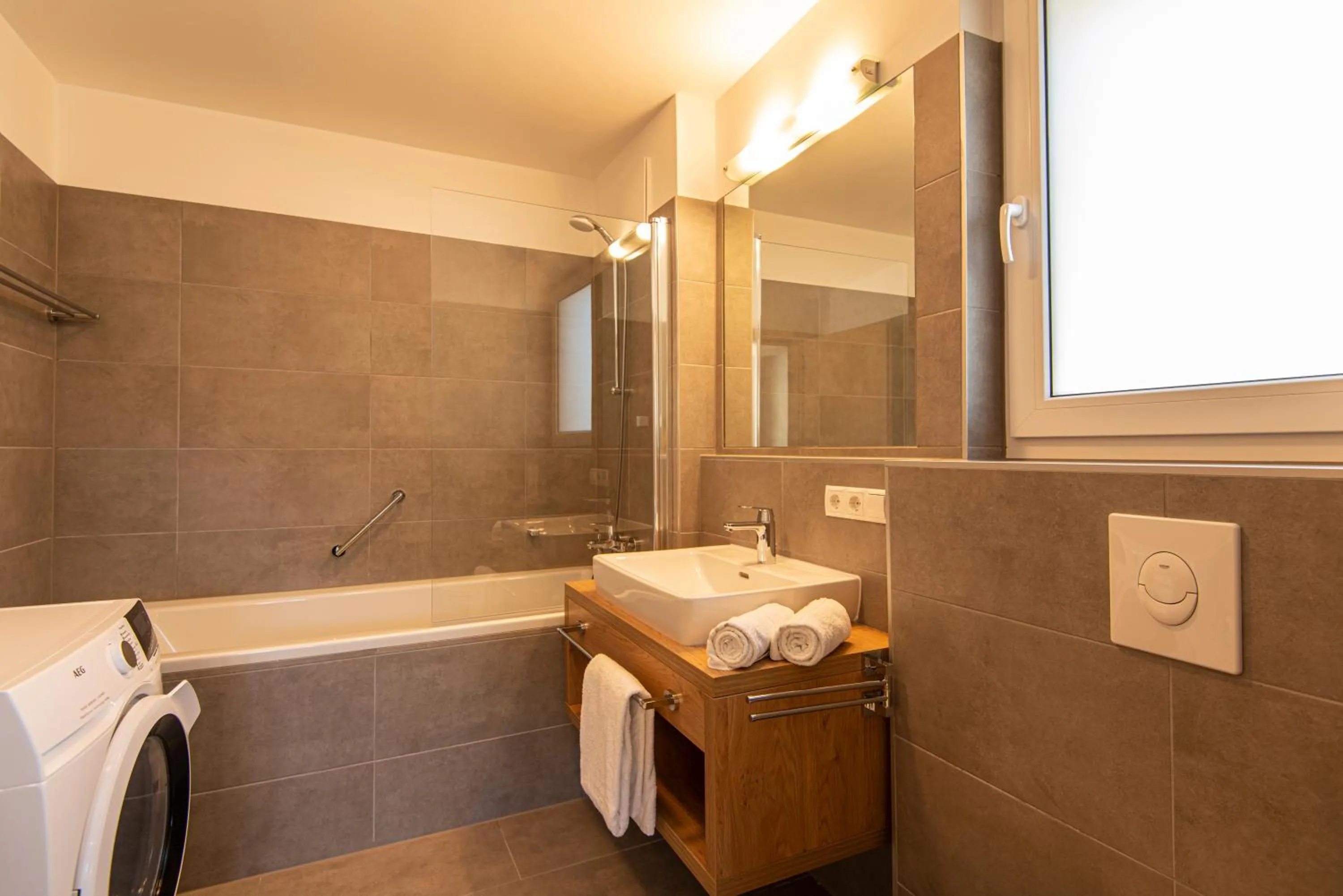 Bathroom in Apartment Dorf Wagrain Alpenleben by AlpenTravel