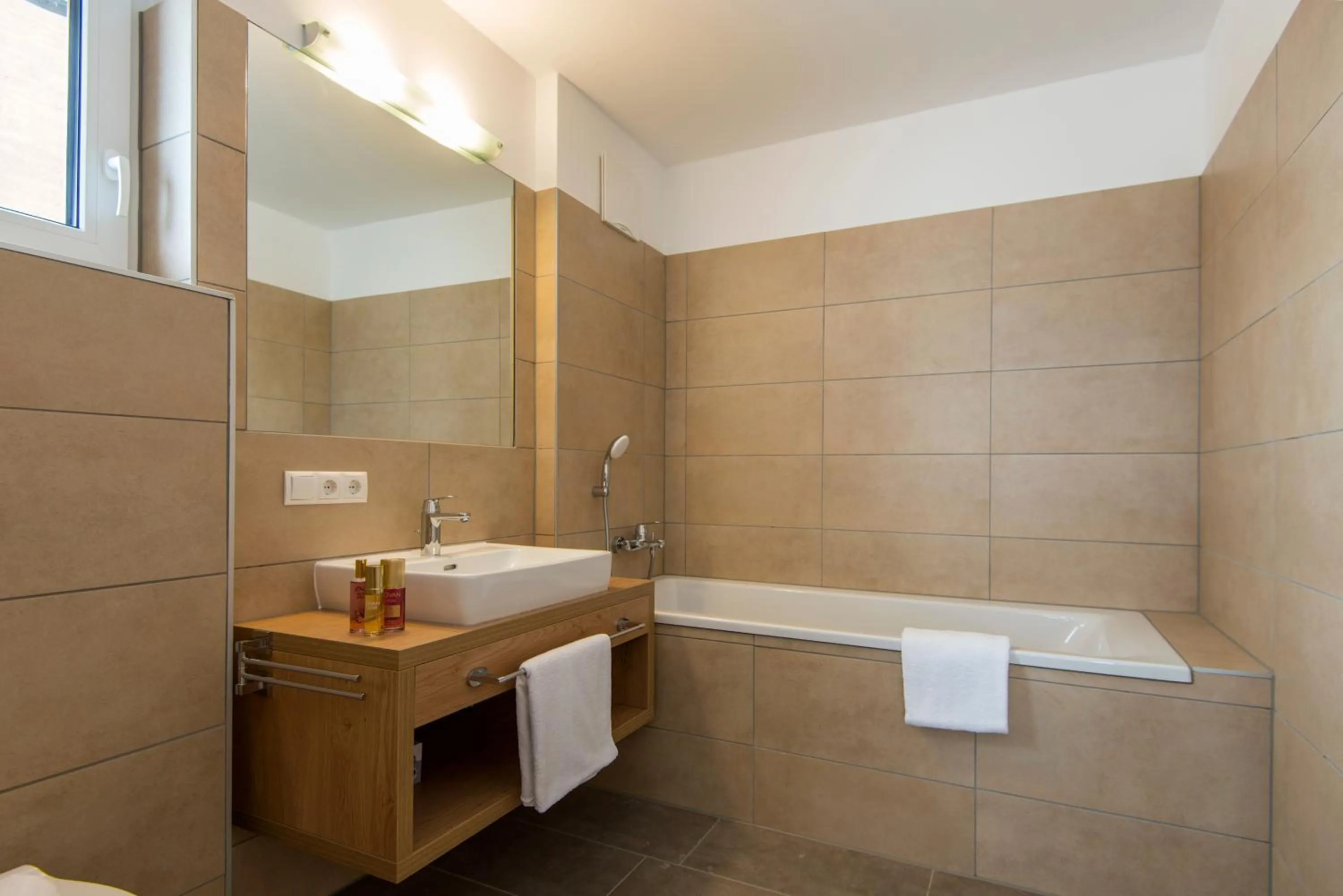 Bathroom in Apartment Dorf Wagrain Alpenleben by AlpenTravel
