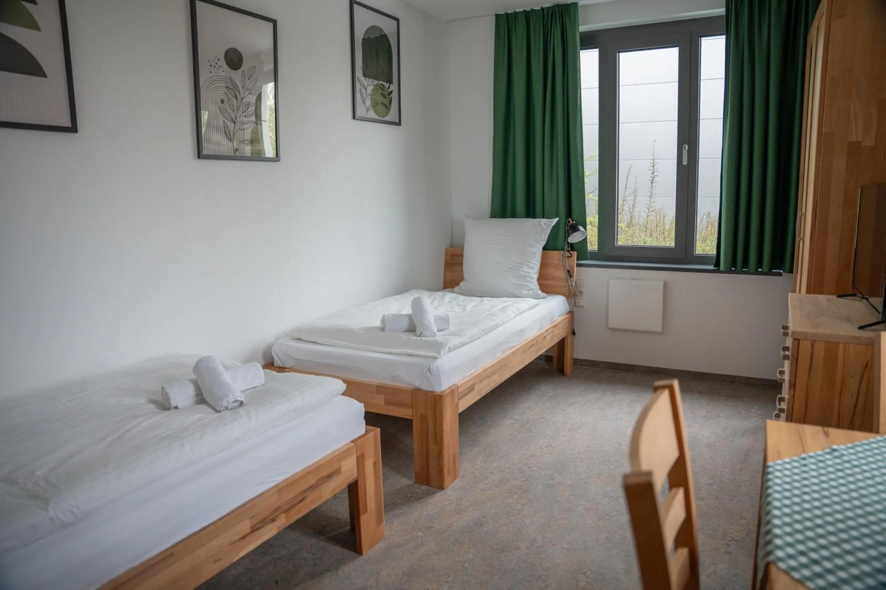 Bed in Hotel Garni Fischerfleck in Ismaning near Munich