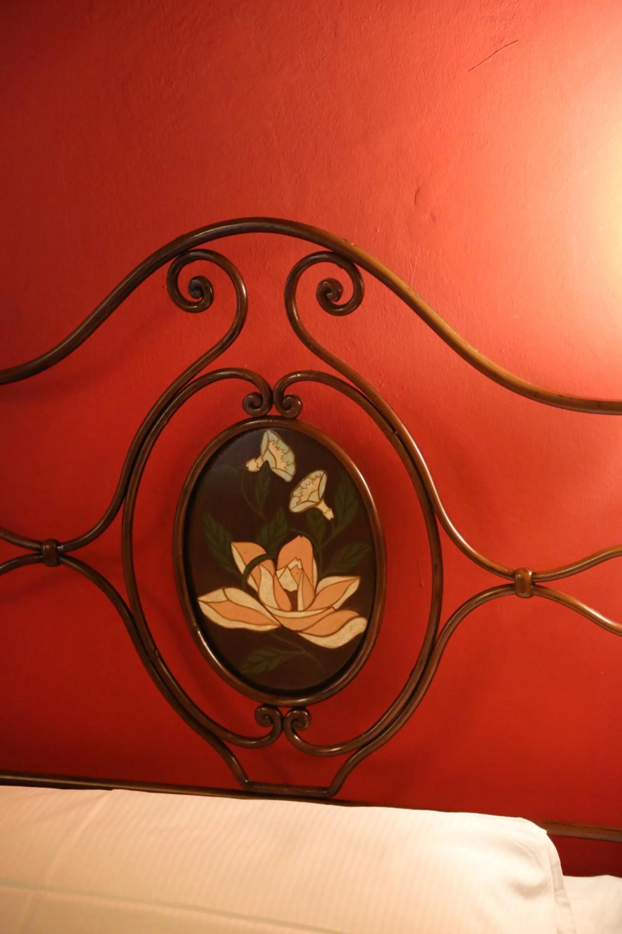 Decorative detail, Bed in Albergo delle Drapperie