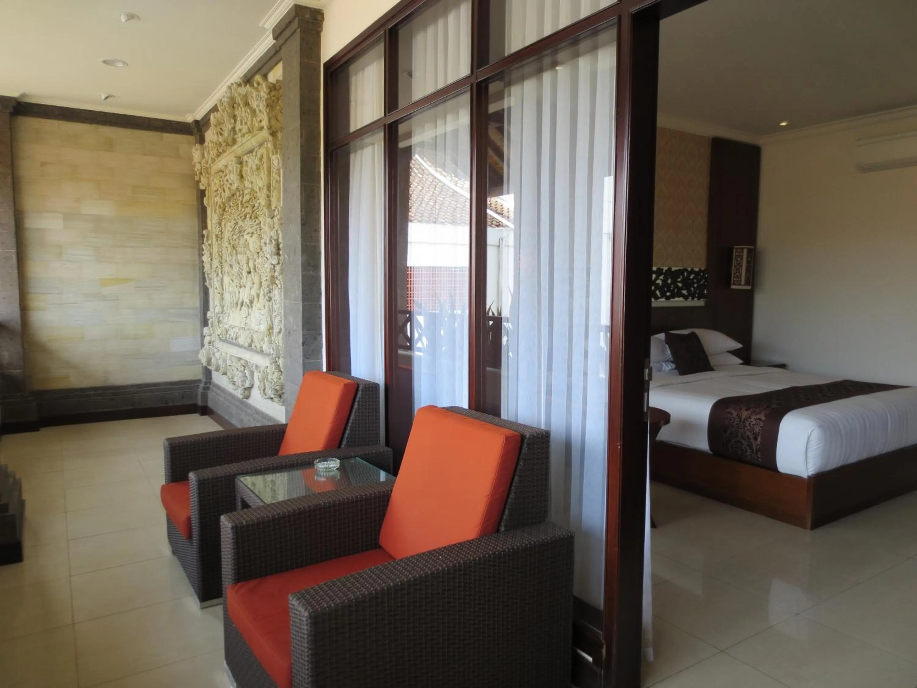 Balcony/Terrace, Bed in Ari Putri Hotel