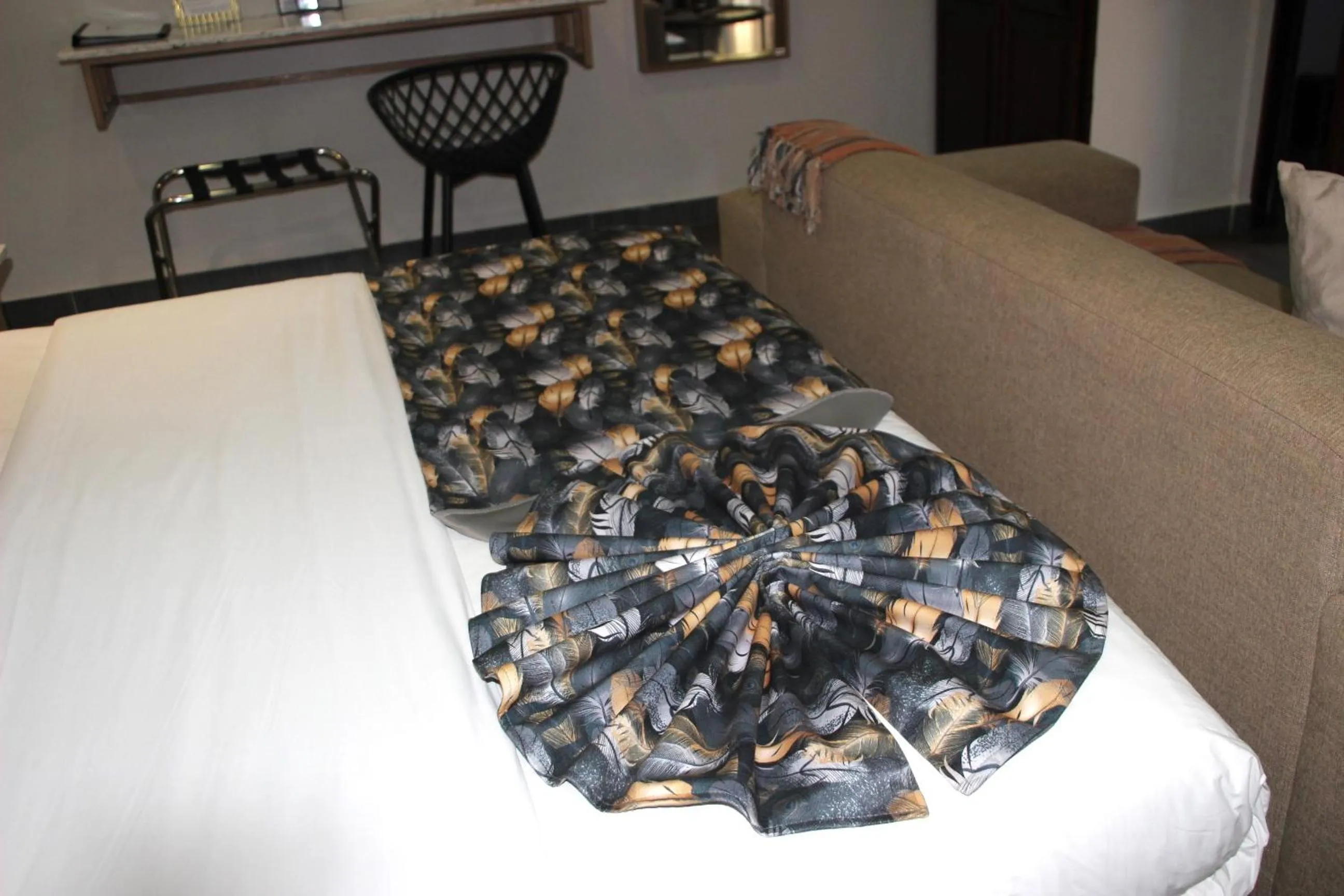 Bed in Ecolux Boutique Hotel