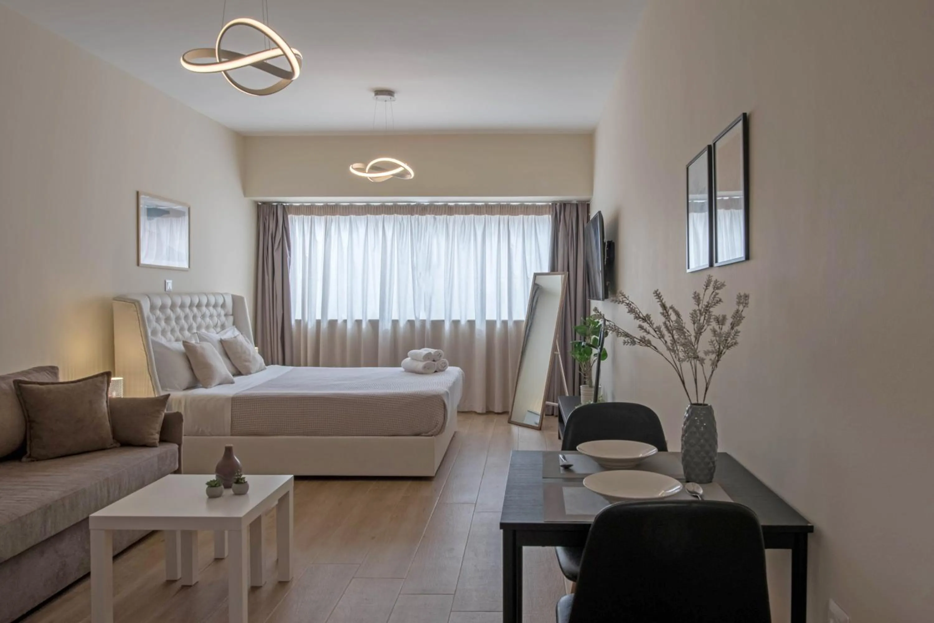 Dining area, Bed in Amazing Apartments @ Aiolou Str.