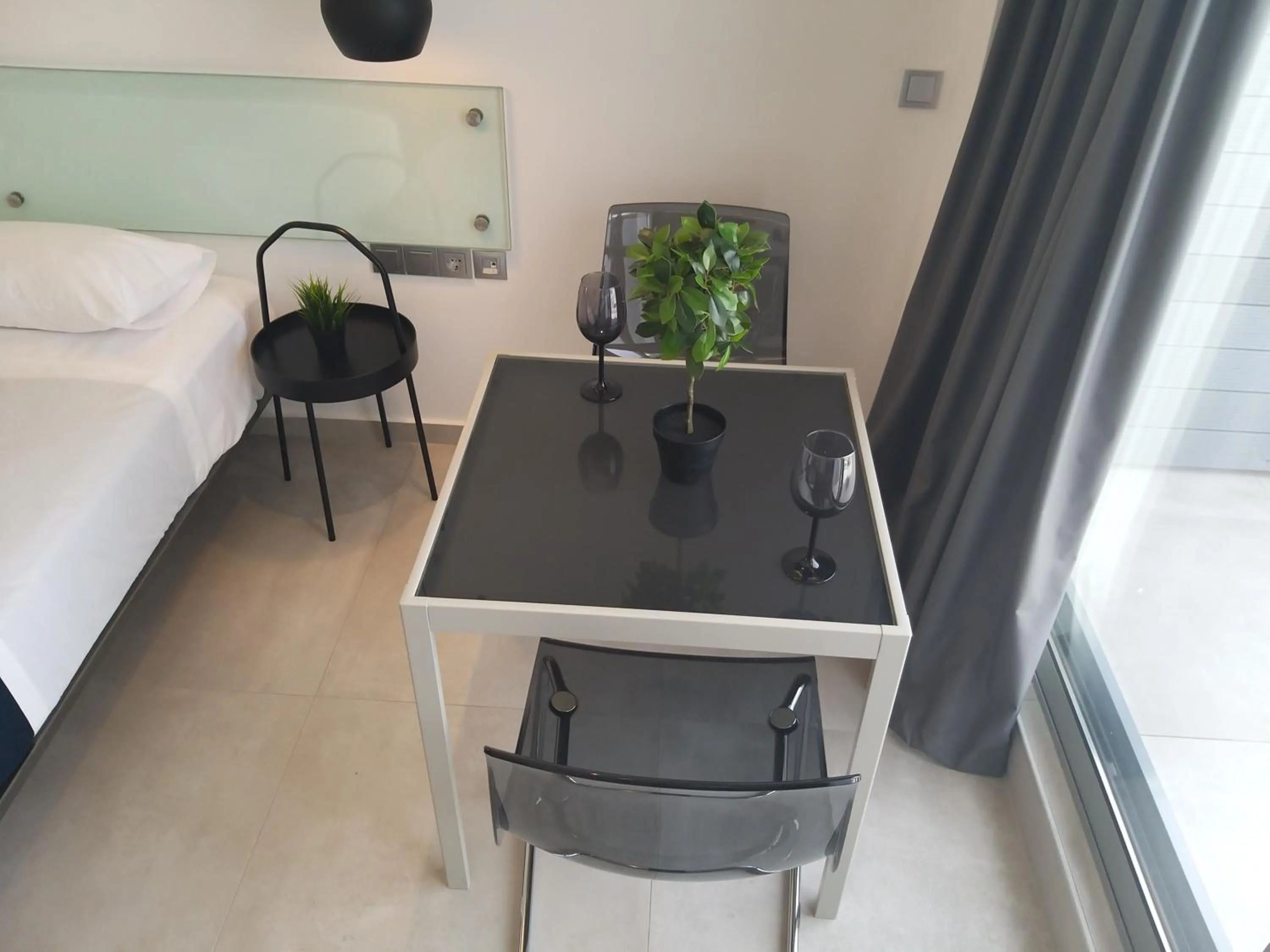 Dining area, Bed in Amazing Apartments @ Aiolou Str.