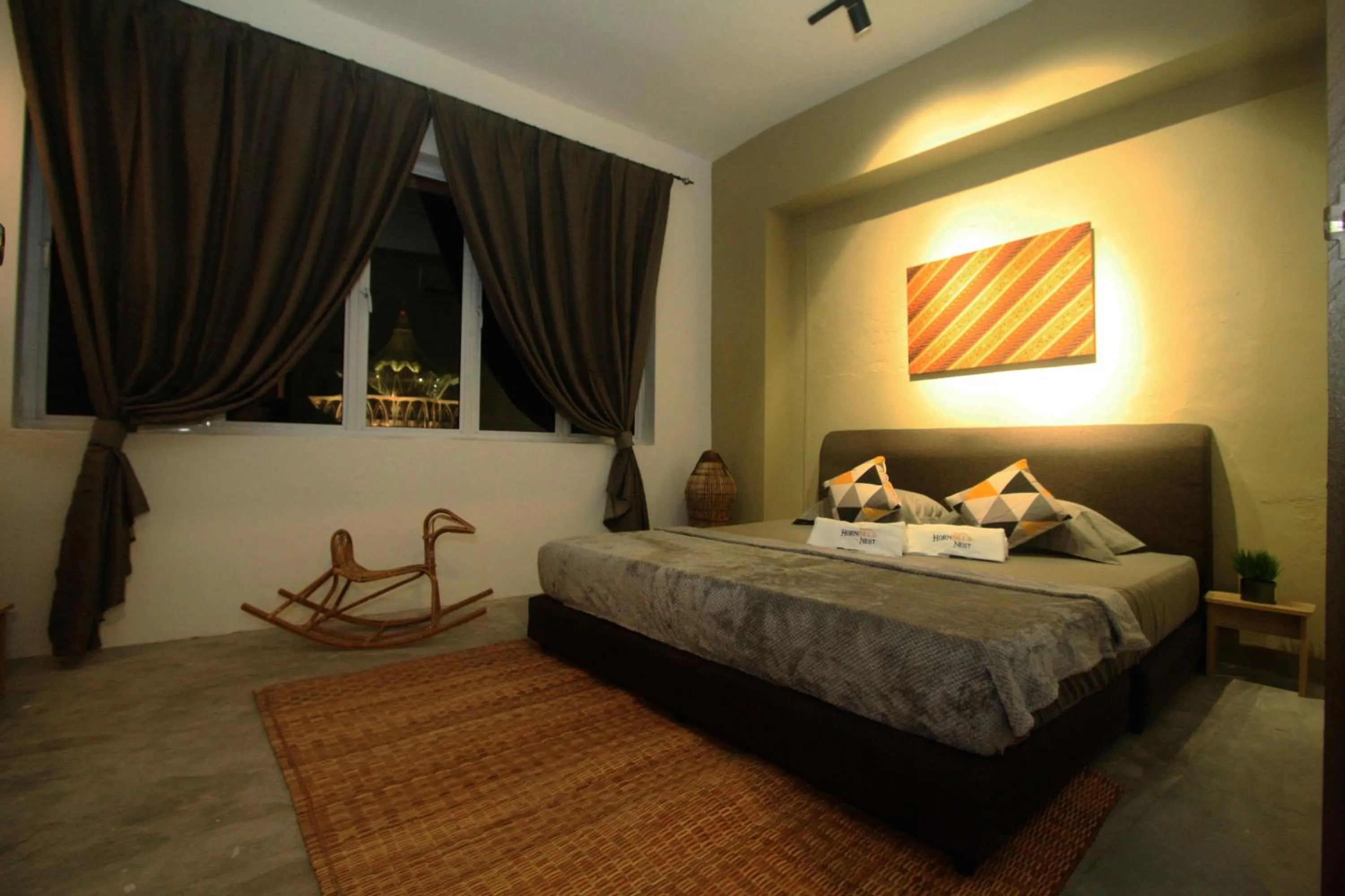 Photo of the whole room, Bed in Hornbill's Nest Kuching