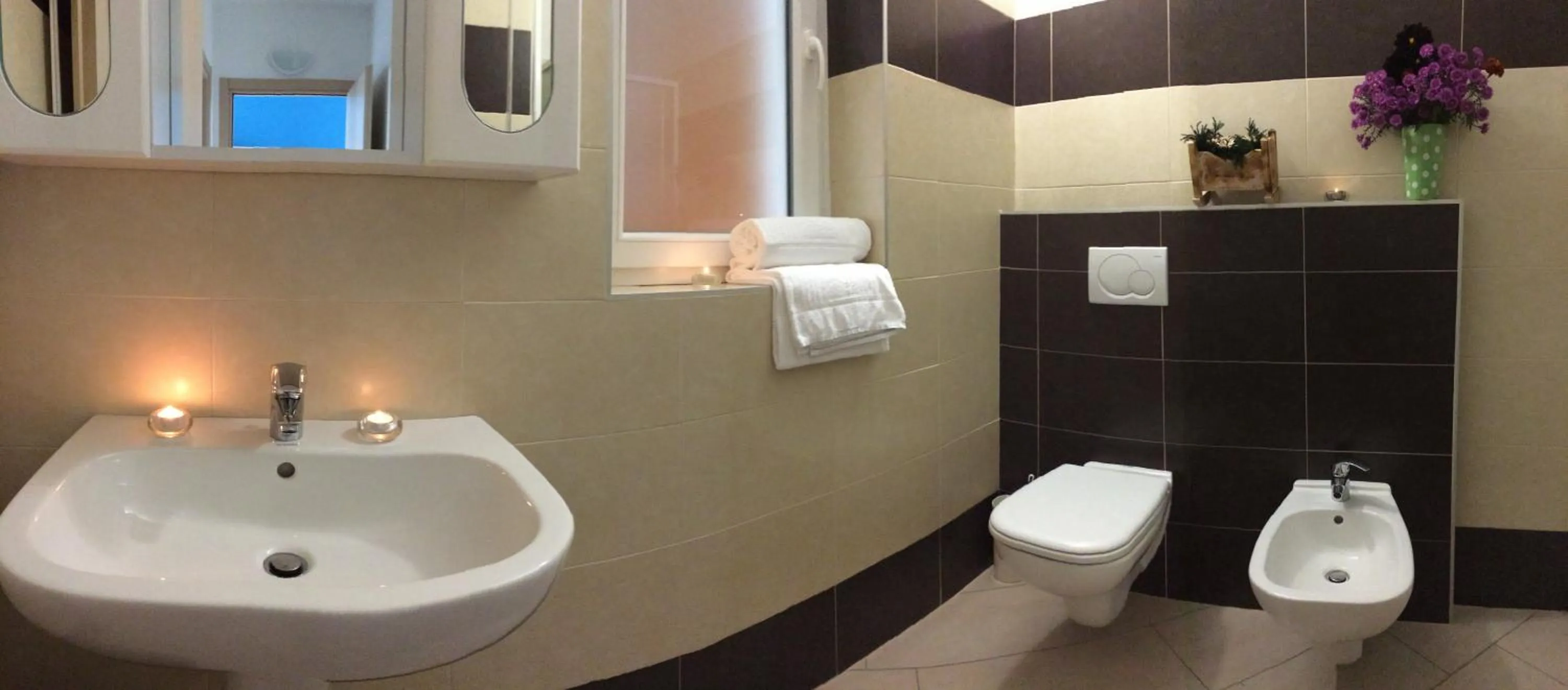 Bathroom in Residence Le Azalee & SPA