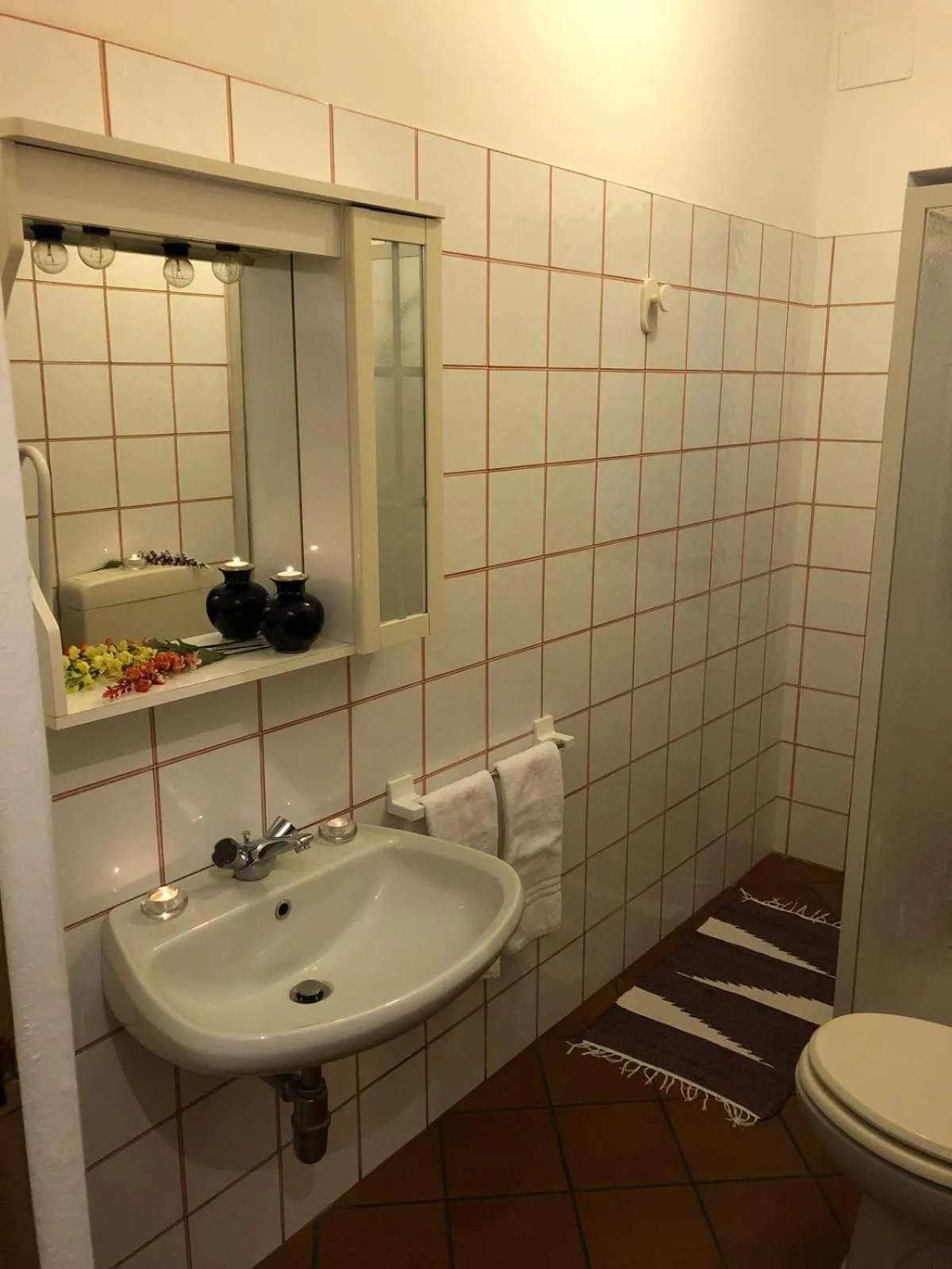 Bathroom in Residence Le Azalee & SPA