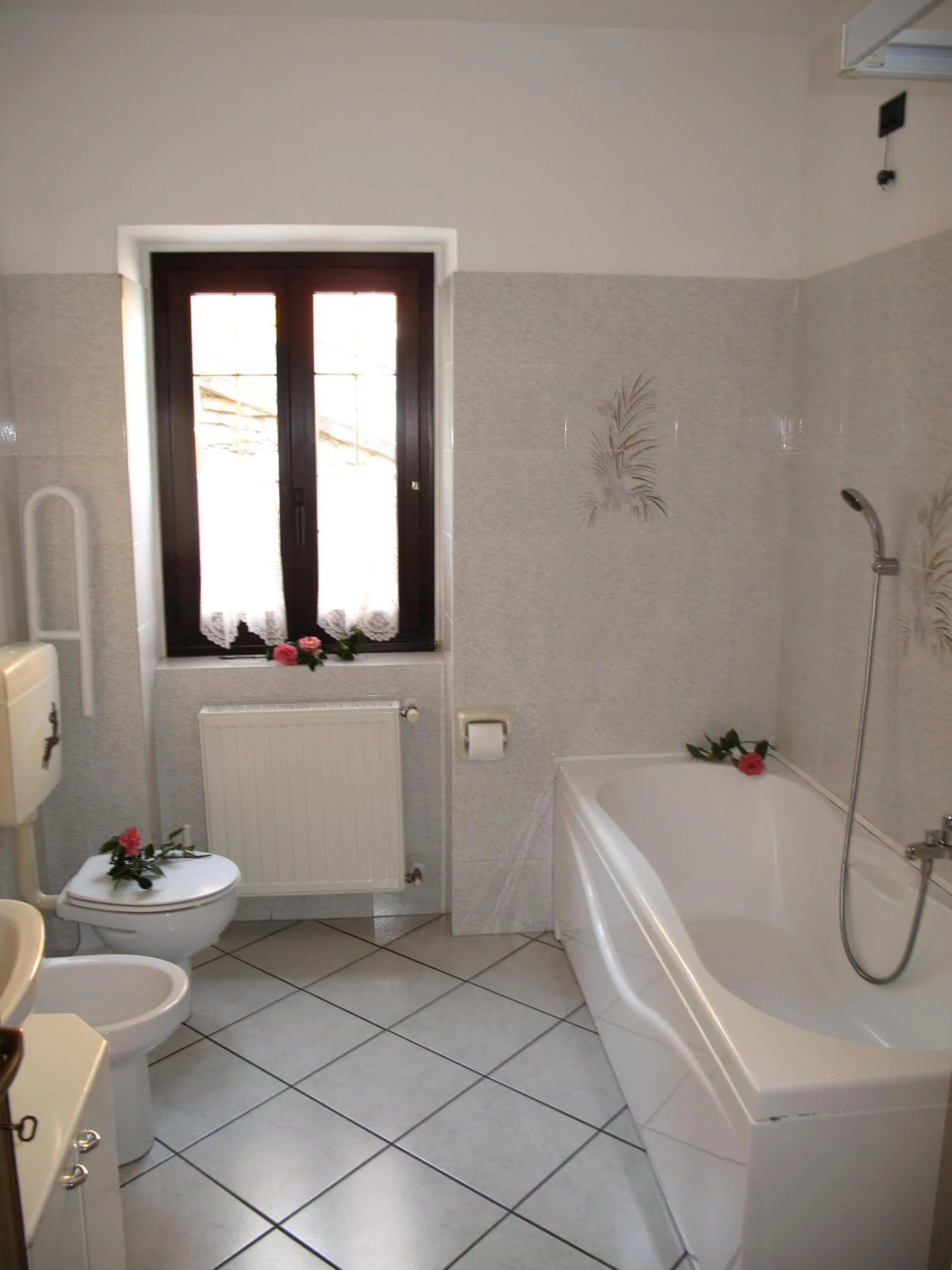 Bathroom in Residence Le Azalee & SPA