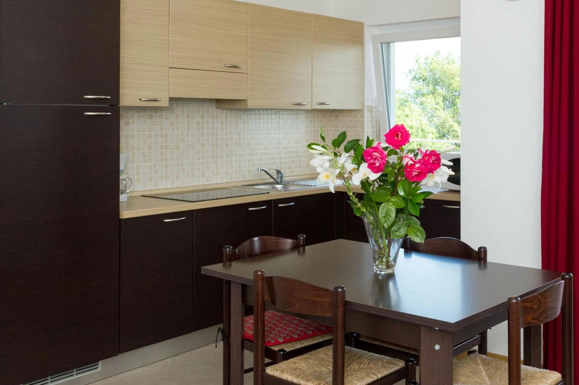 Kitchen or kitchenette in Residence Le Azalee & SPA