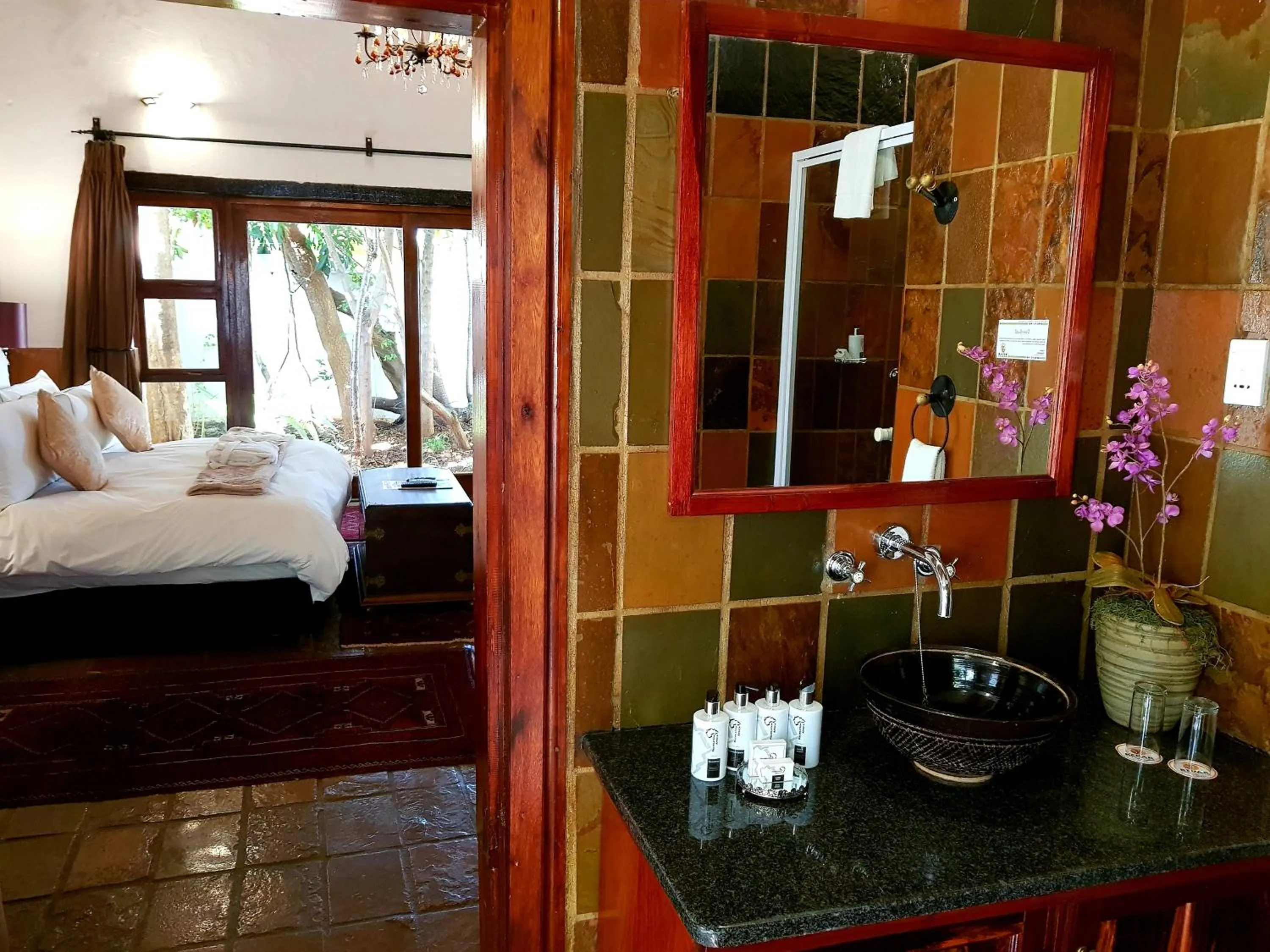 Bathroom, Bed in Kedar Heritage Lodge, Conference Centre & Spa