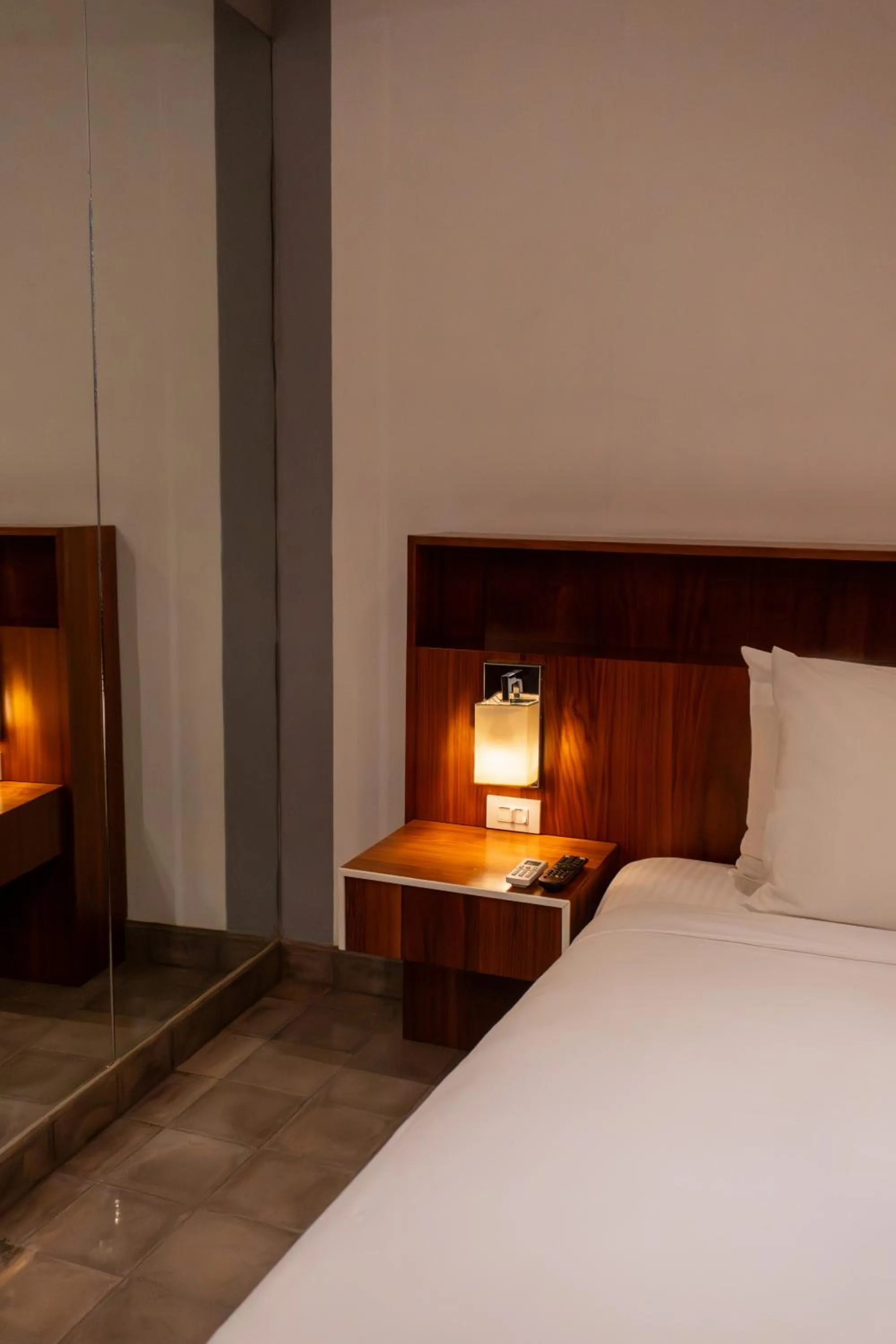 Bed in Flor de Mayo Hotel & Restaurant