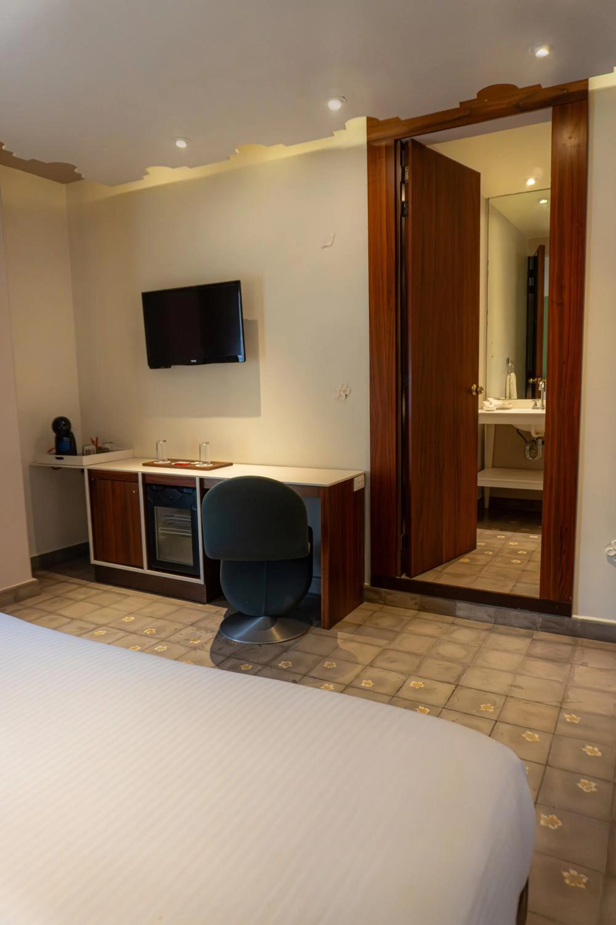 Bed in Flor de Mayo Hotel & Restaurant