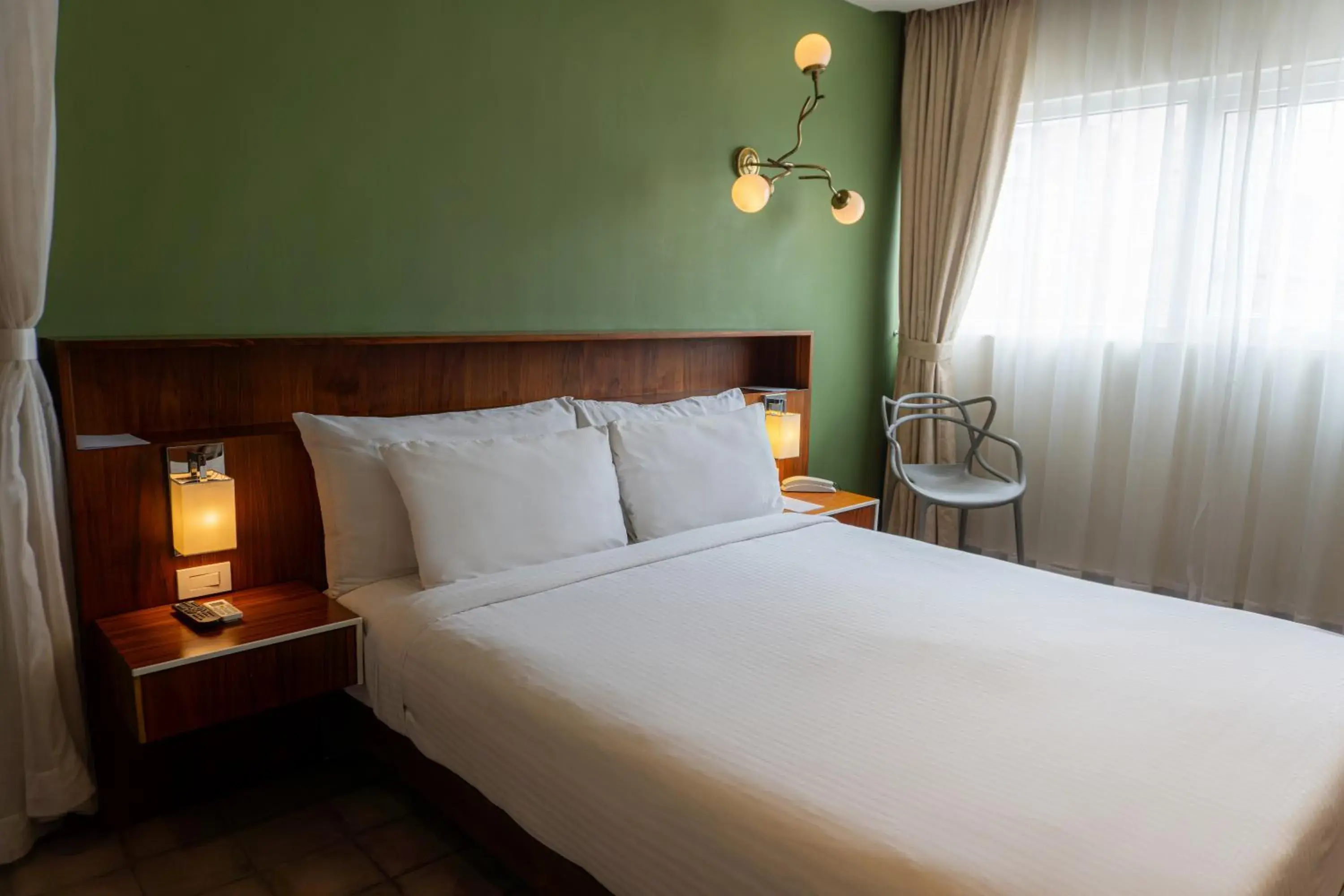 Bed in Flor de Mayo Hotel & Restaurant Bed in Flor de Mayo Hotel & Restaurant