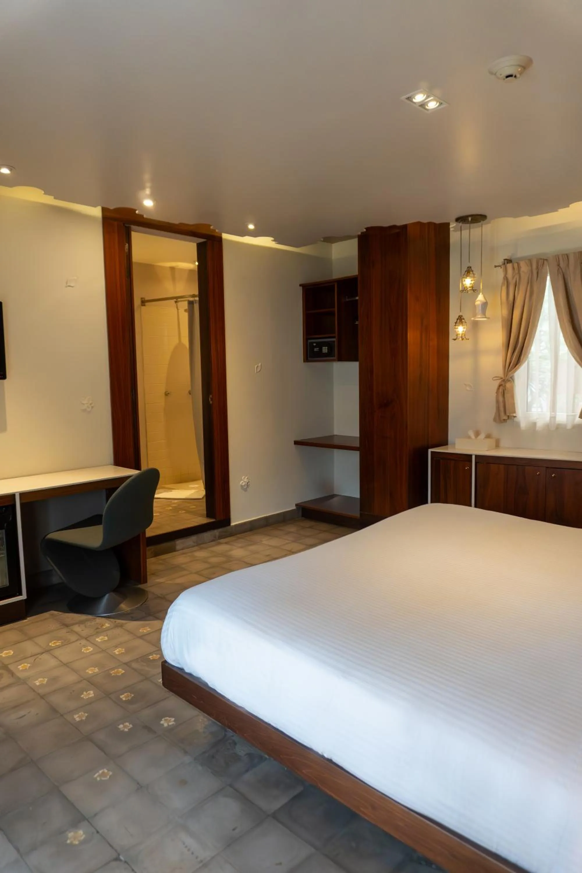 Bed in Flor de Mayo Hotel & Restaurant