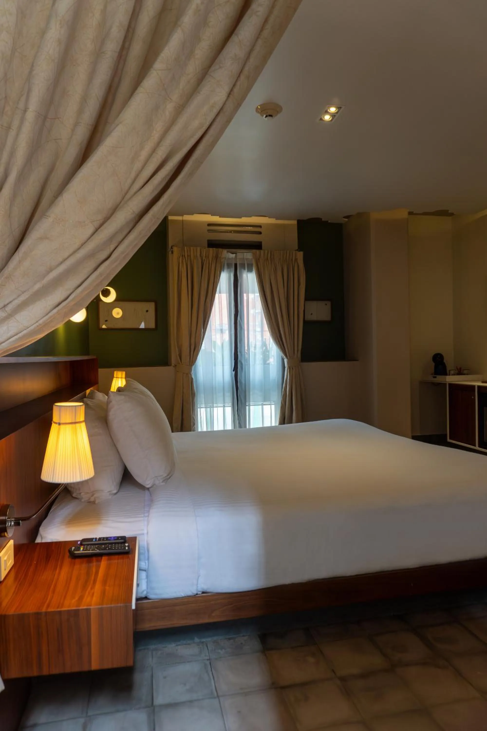 Bed in Flor de Mayo Hotel & Restaurant