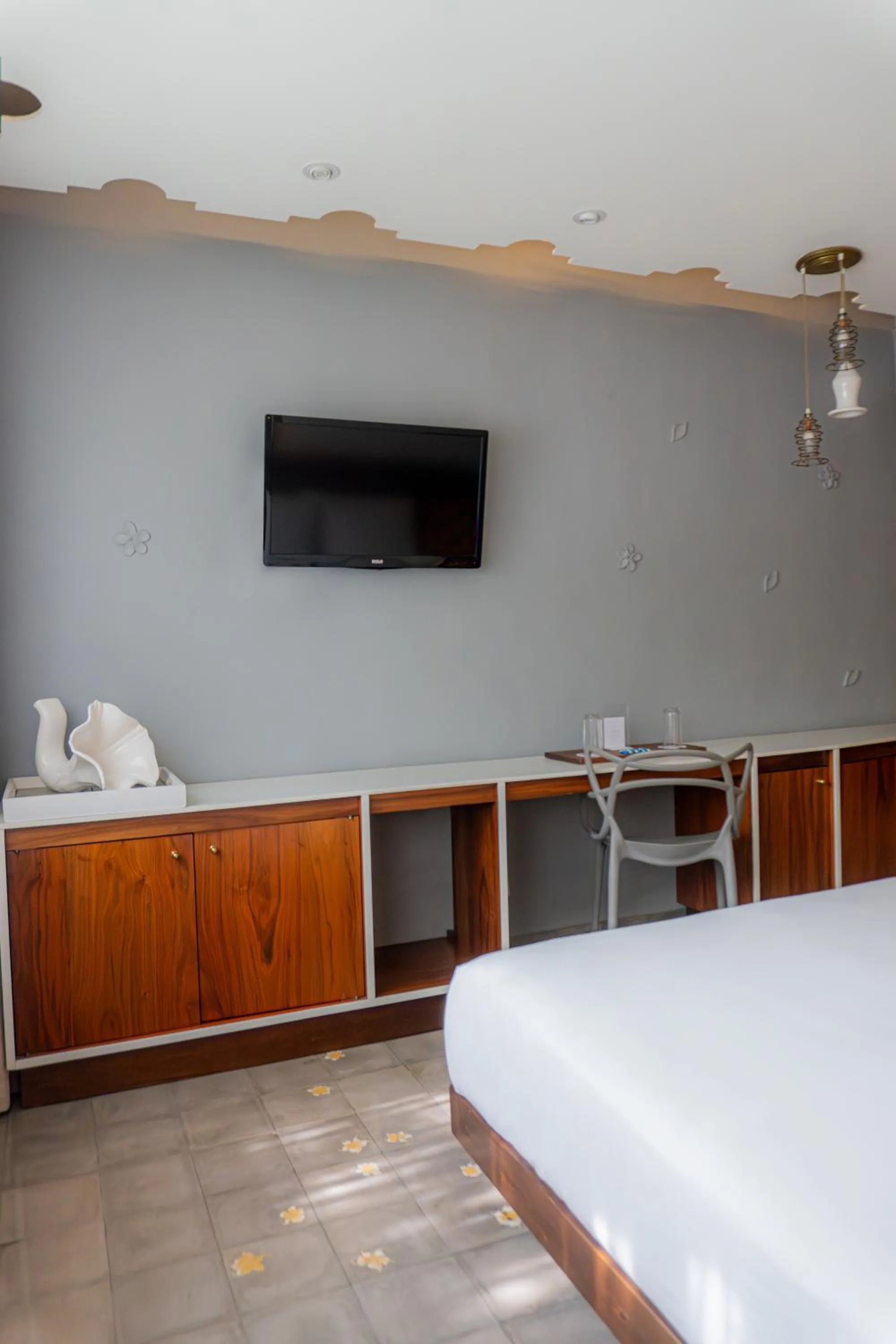 Bed in Flor de Mayo Hotel & Restaurant