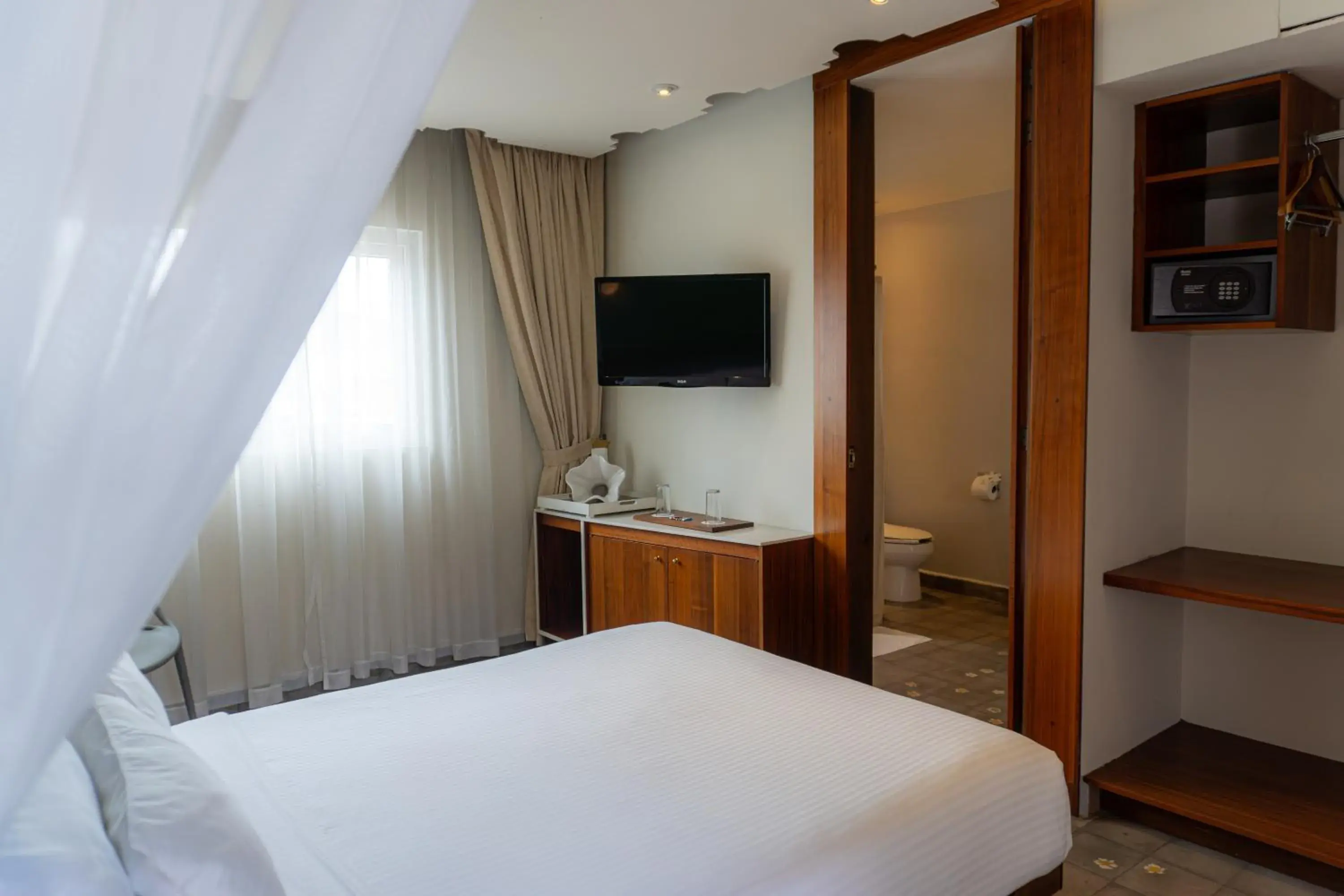 Bed in Flor de Mayo Hotel & Restaurant Bed in Flor de Mayo Hotel & Restaurant