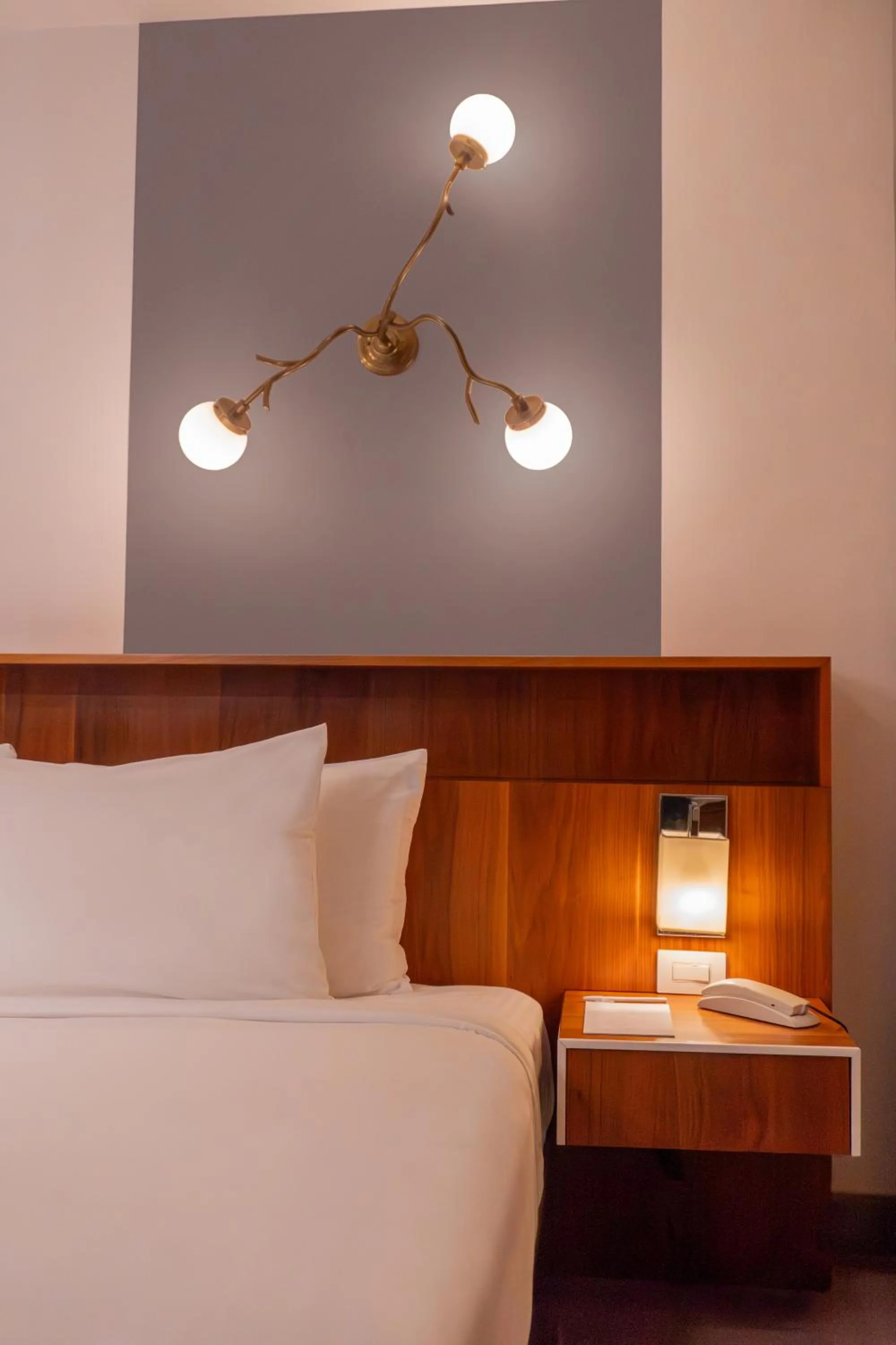 Bed in Flor de Mayo Hotel & Restaurant