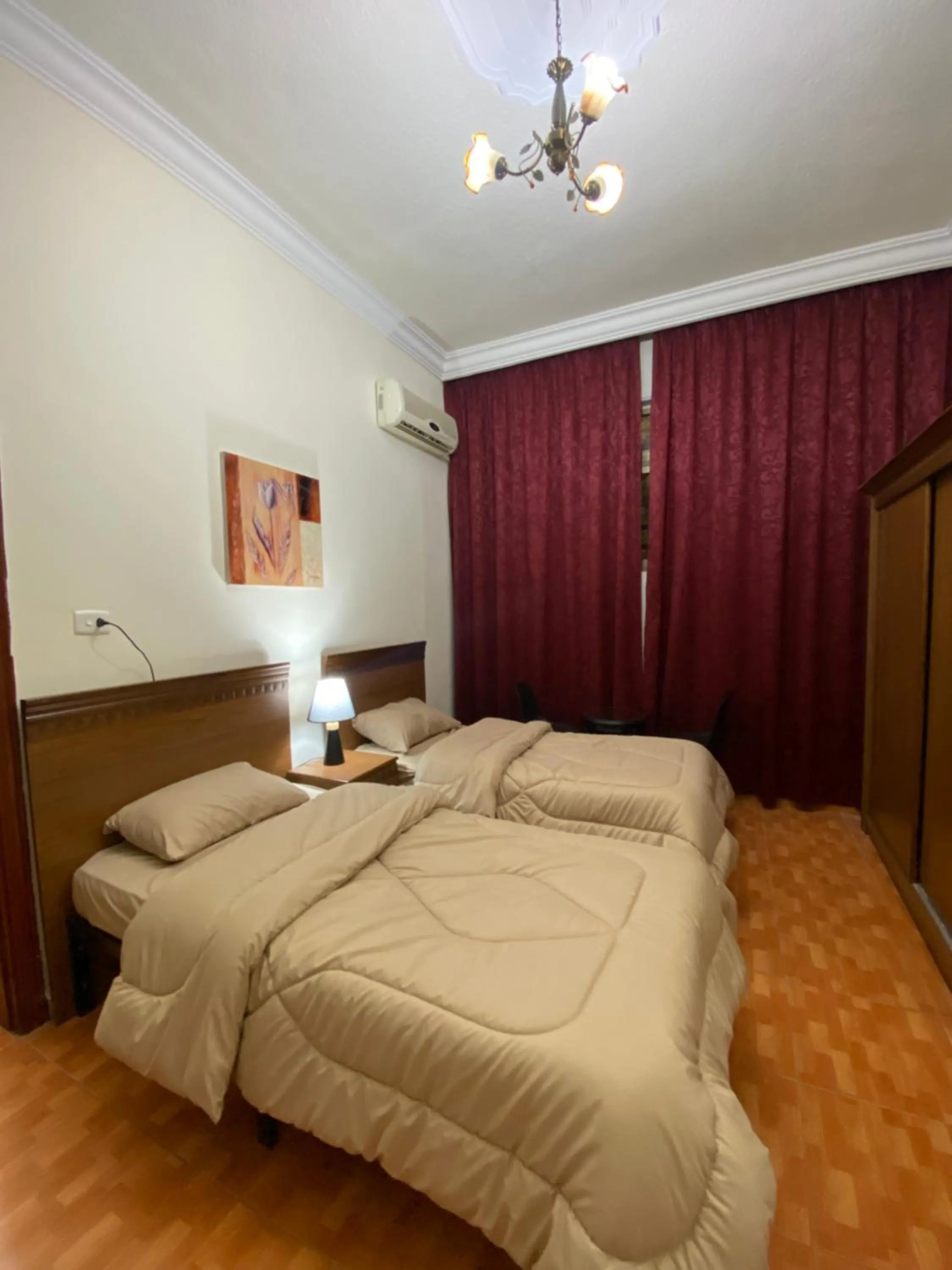 Bed in Sufara Hotel Suites