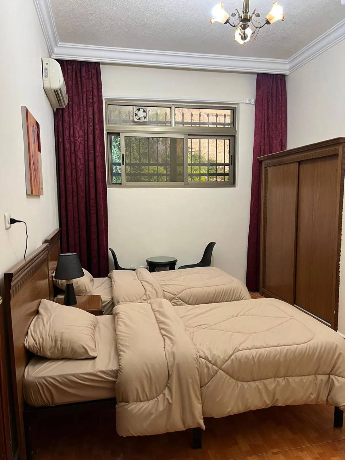 Bed in Sufara Hotel Suites