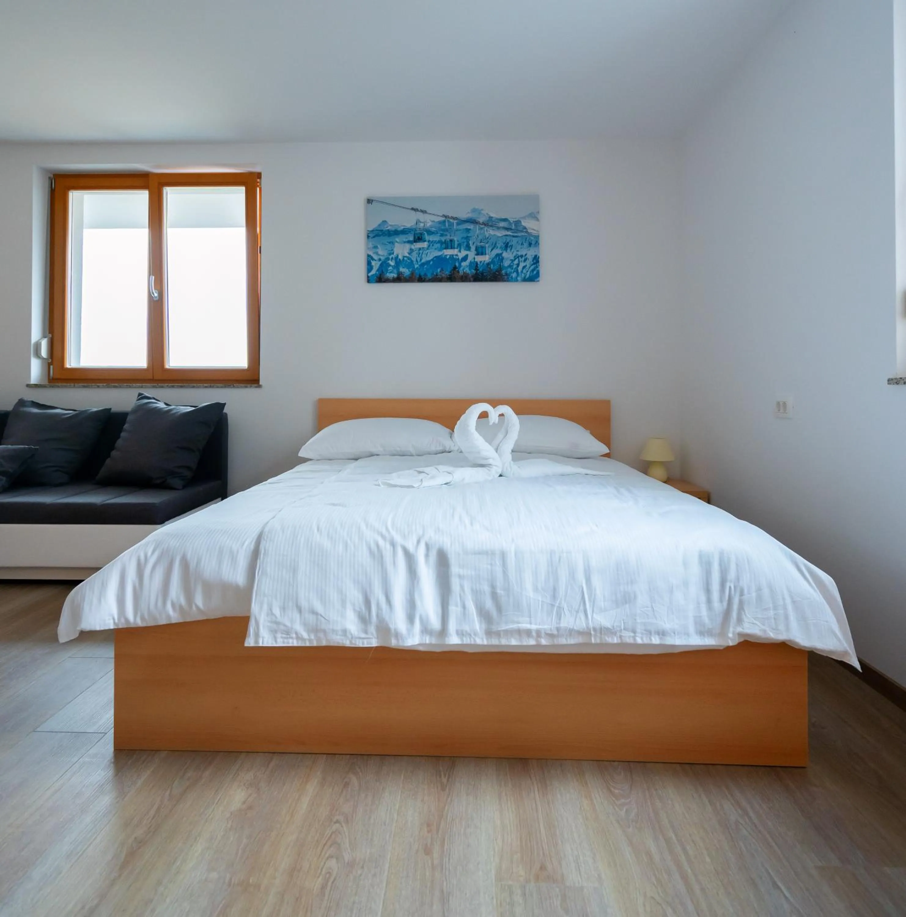 Bed in PJagodic Apartments & Wellness