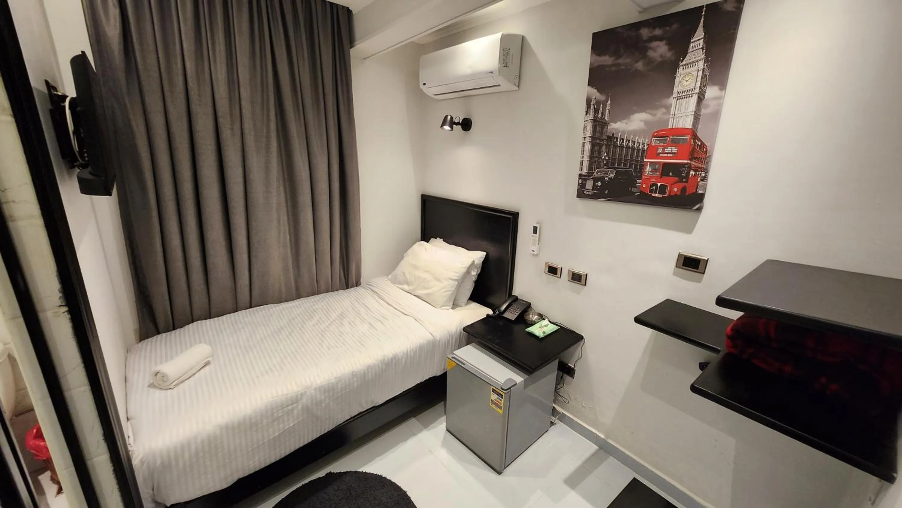 Bed in Helio Cairo Hotel