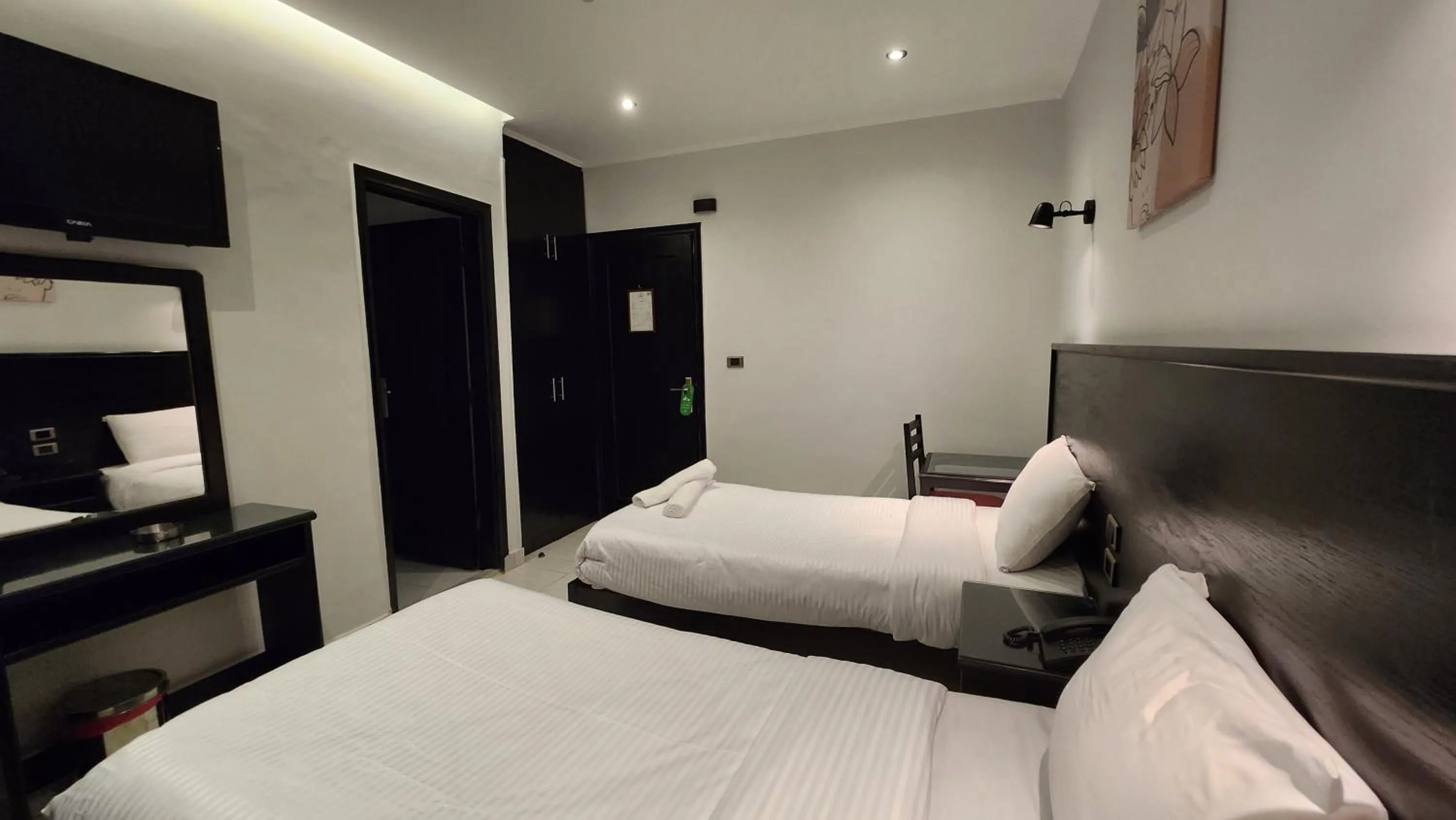 Bed in Helio Cairo Hotel