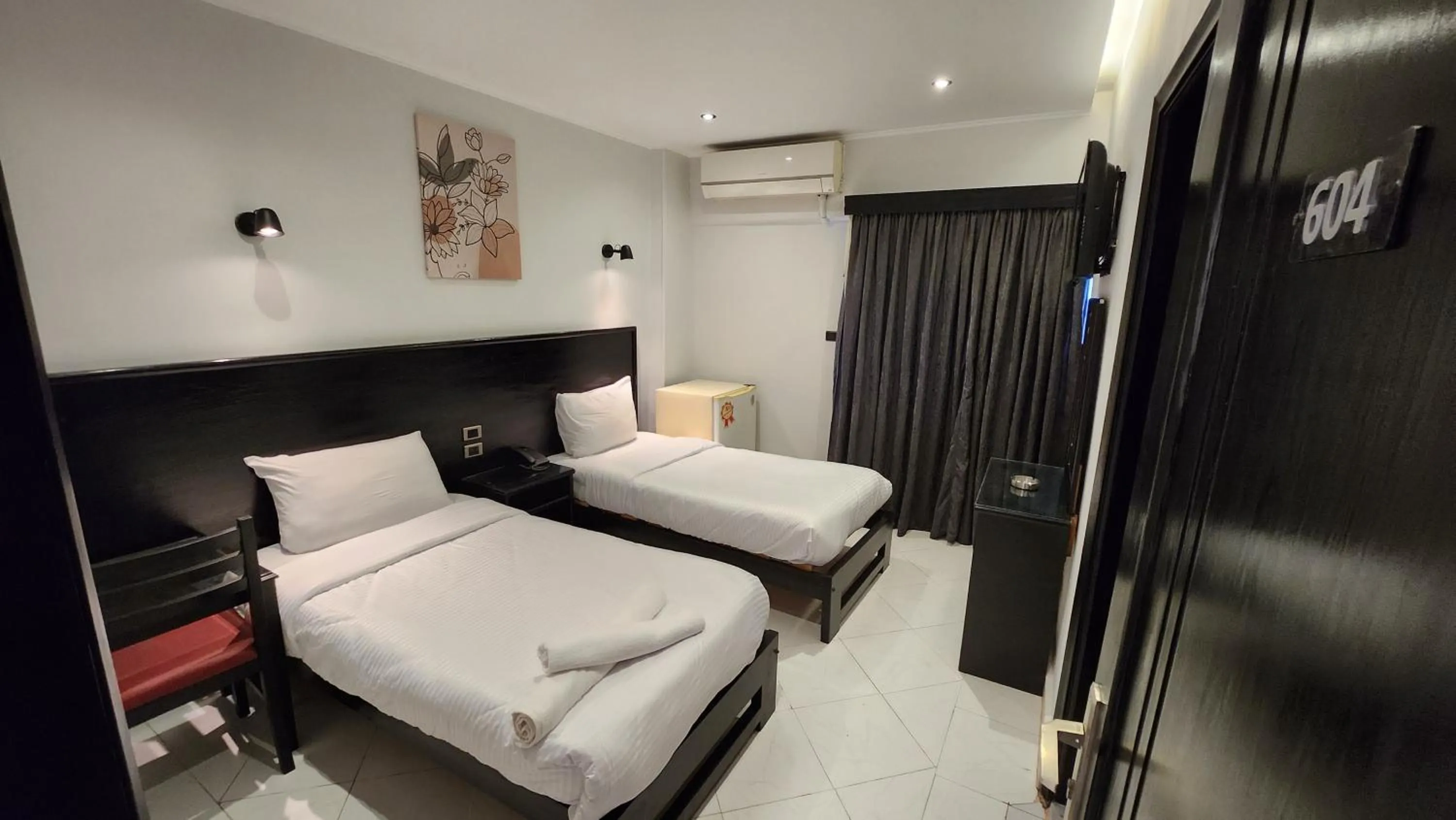 Bed in Helio Cairo Hotel