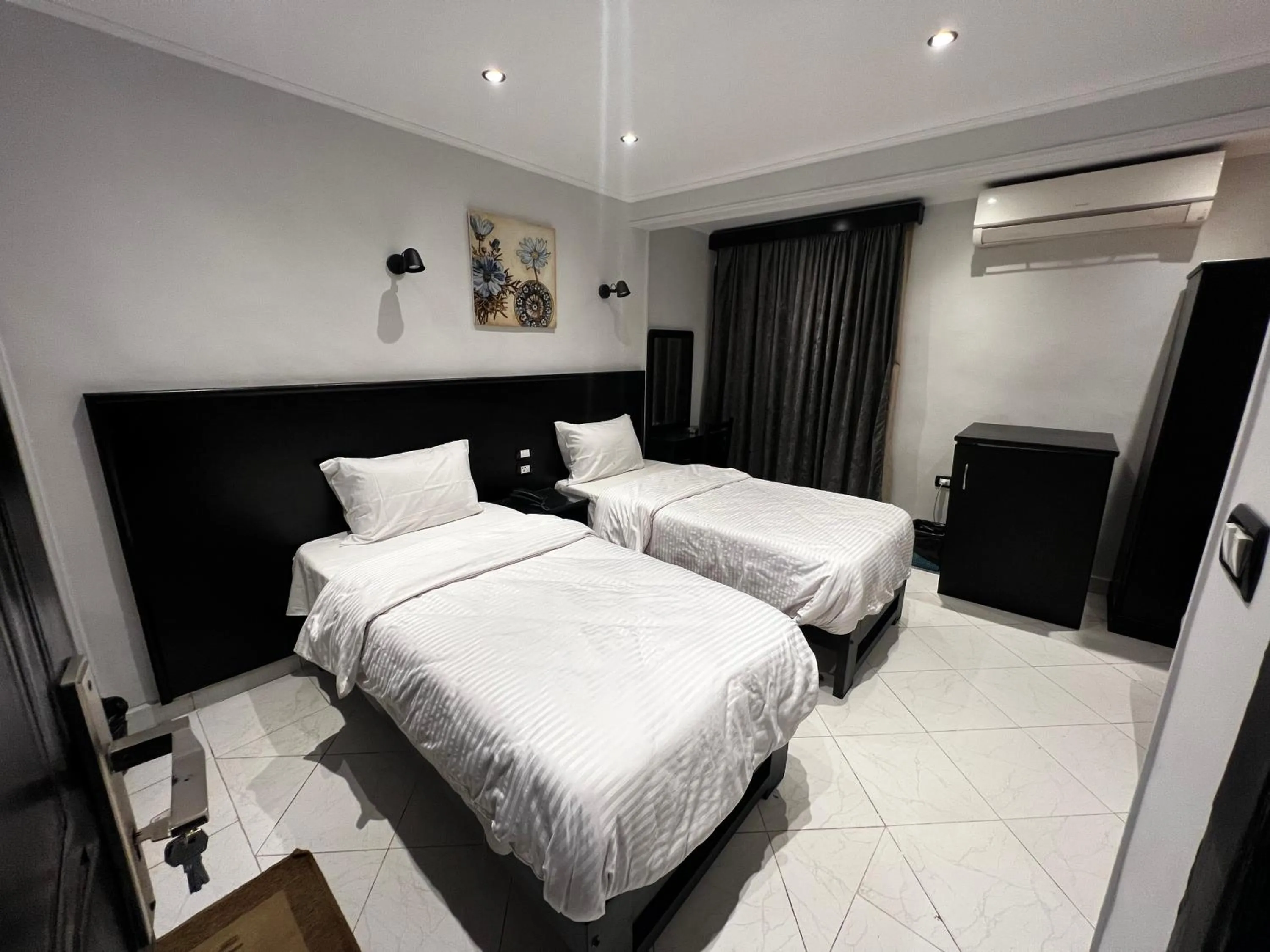 Bed in Helio Cairo Hotel