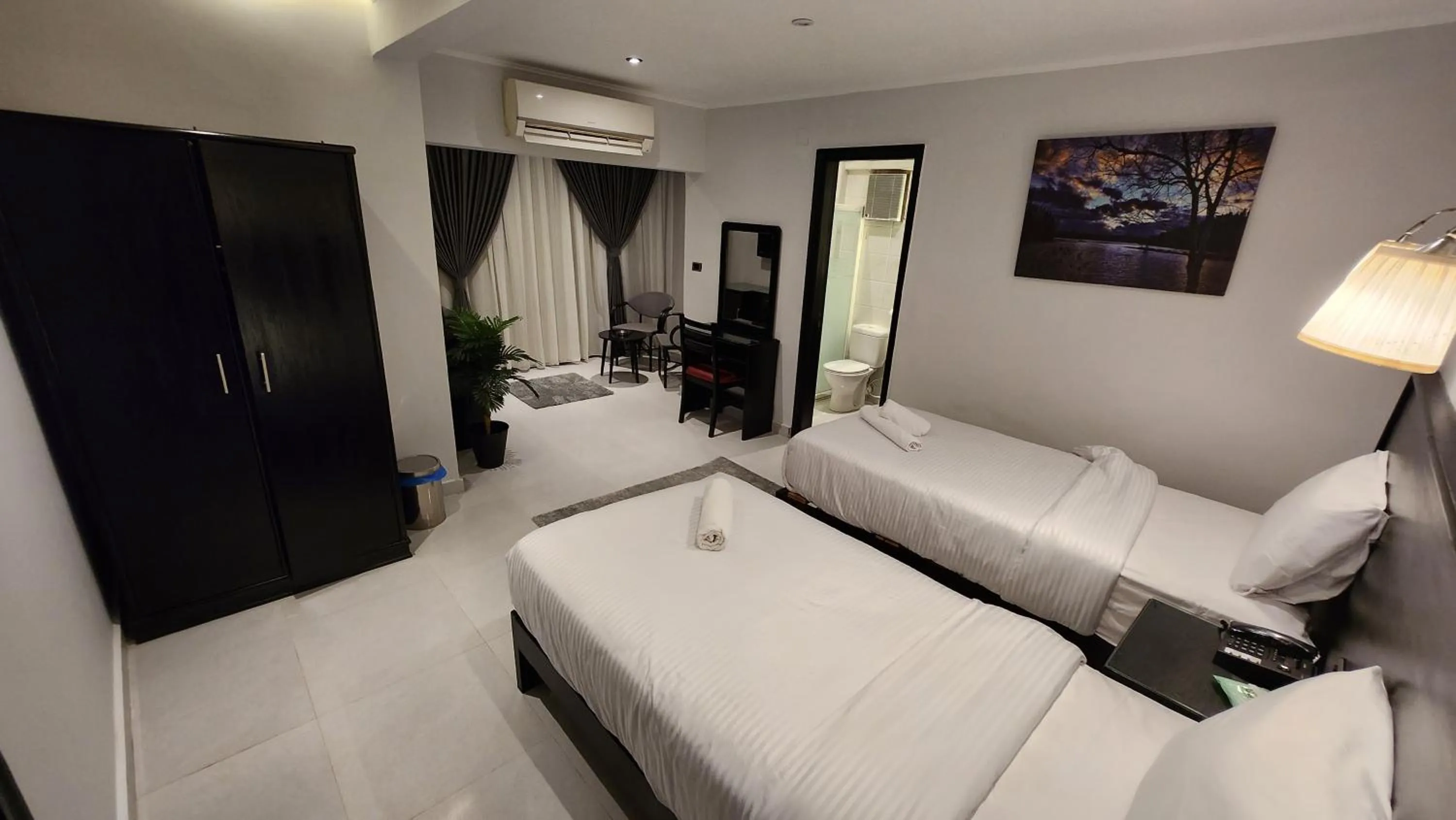 Bed in Helio Cairo Hotel