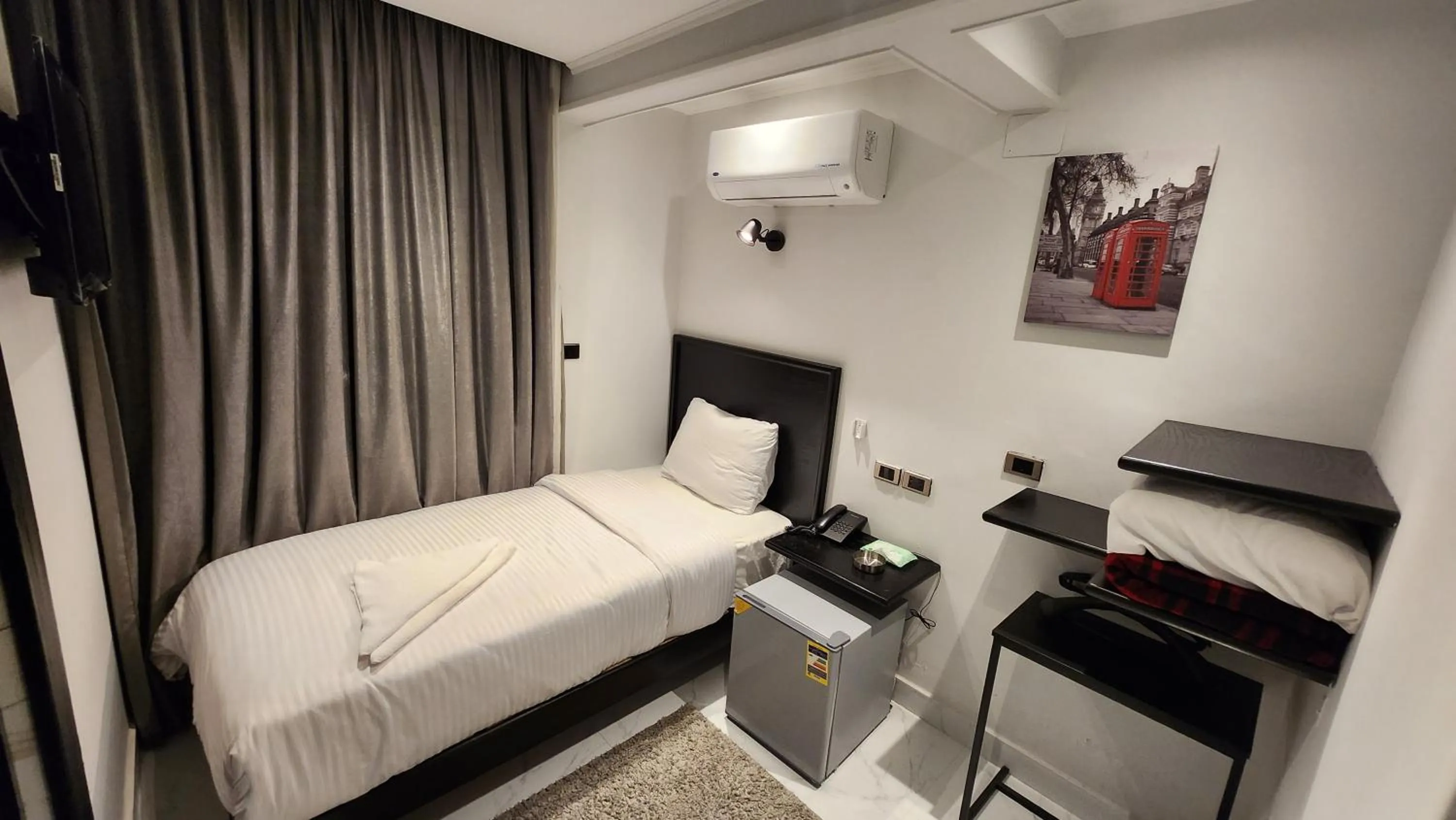 Bed in Helio Cairo Hotel