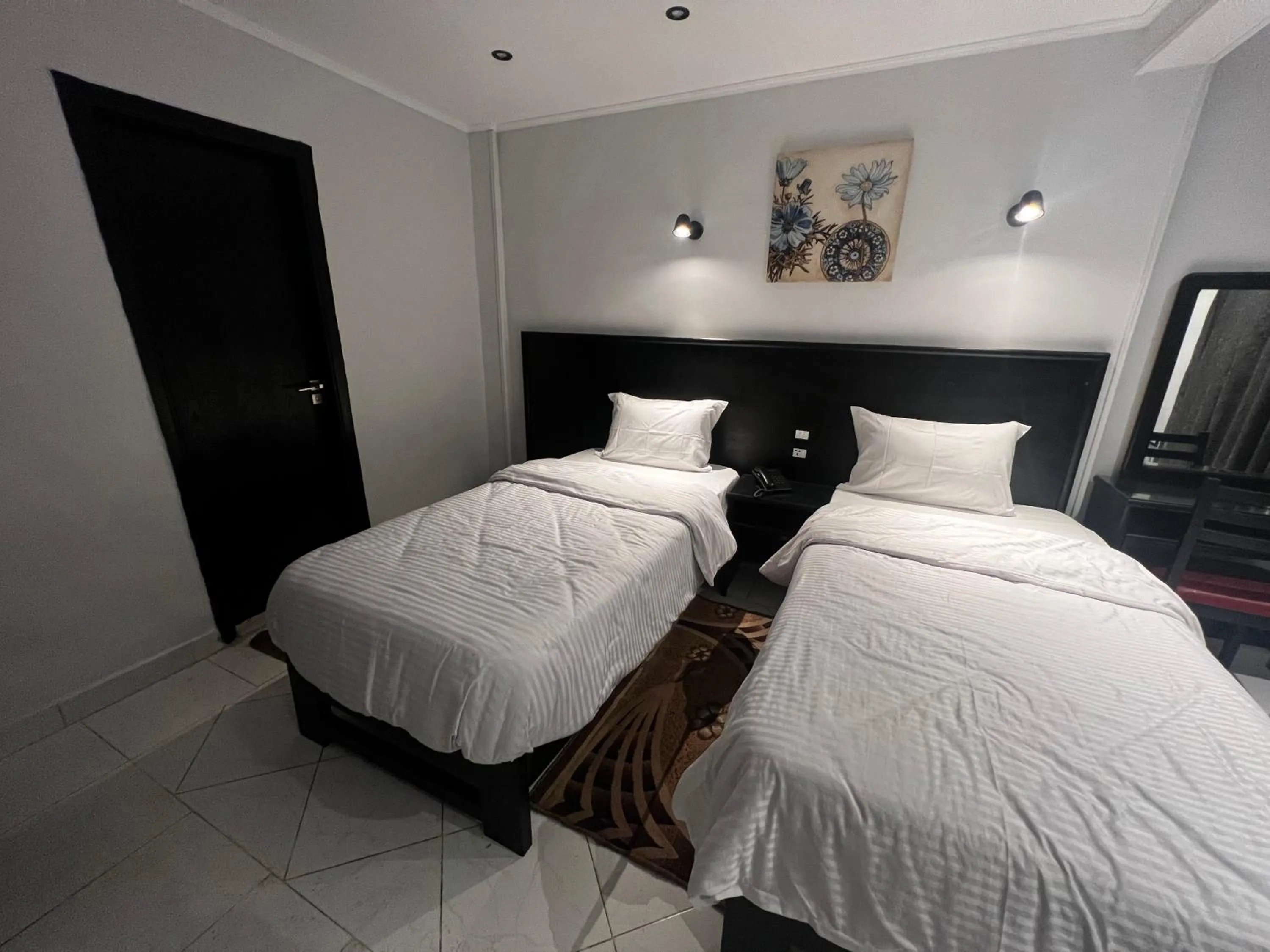 Bed in Helio Cairo Hotel