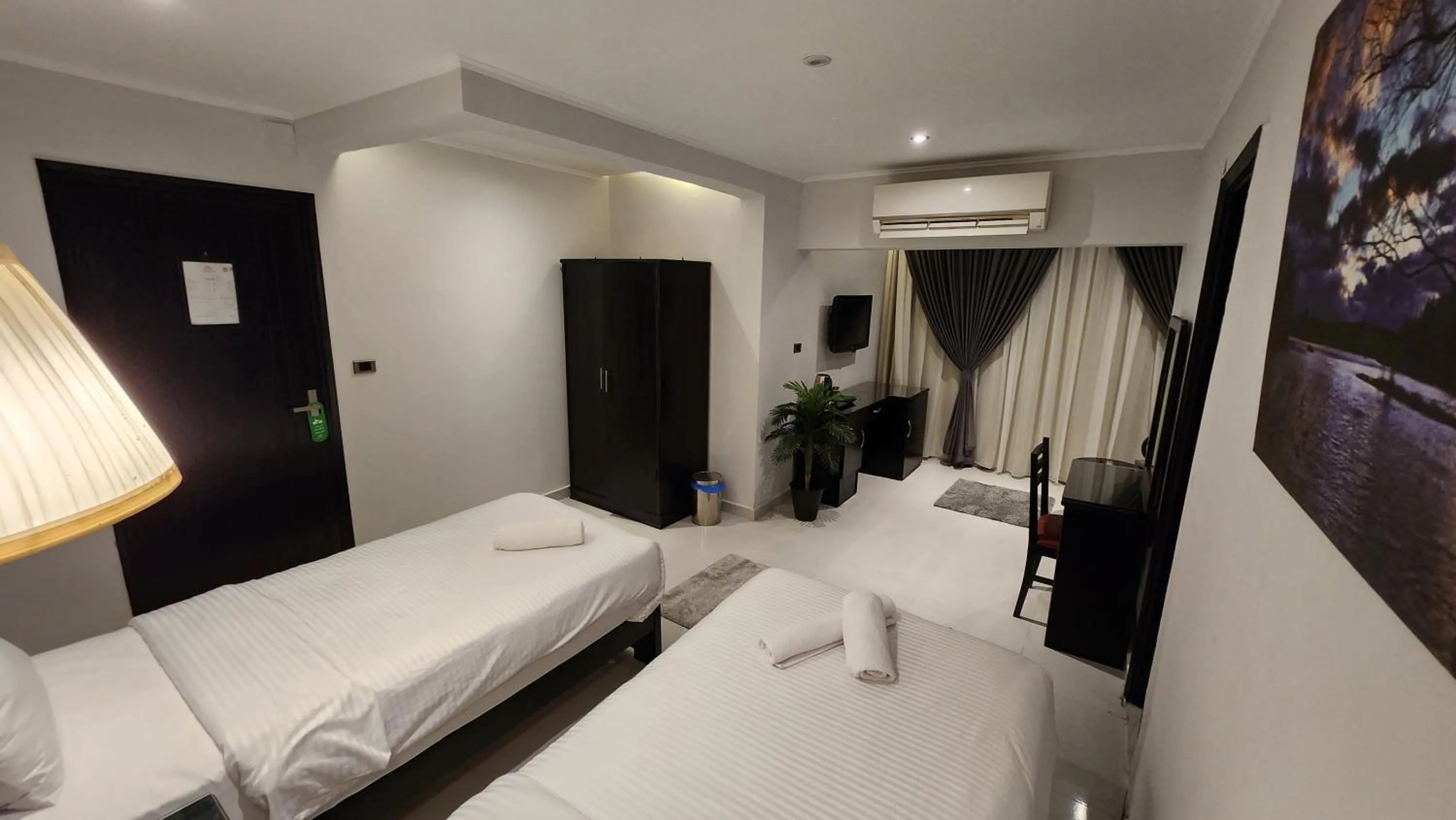 Bed in Helio Cairo Hotel