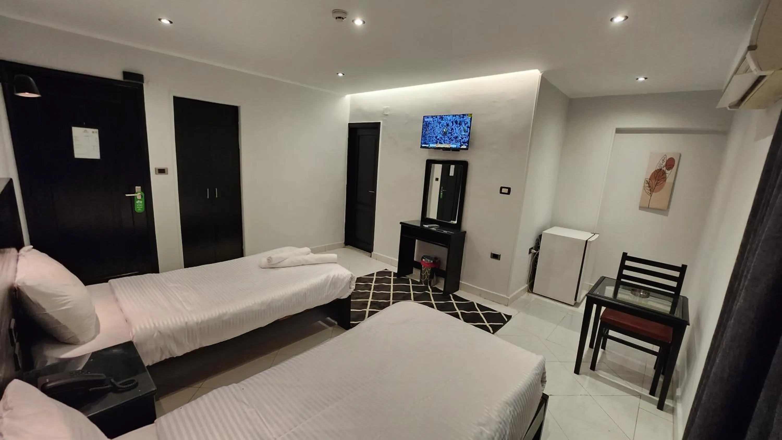 Bed in Helio Cairo Hotel