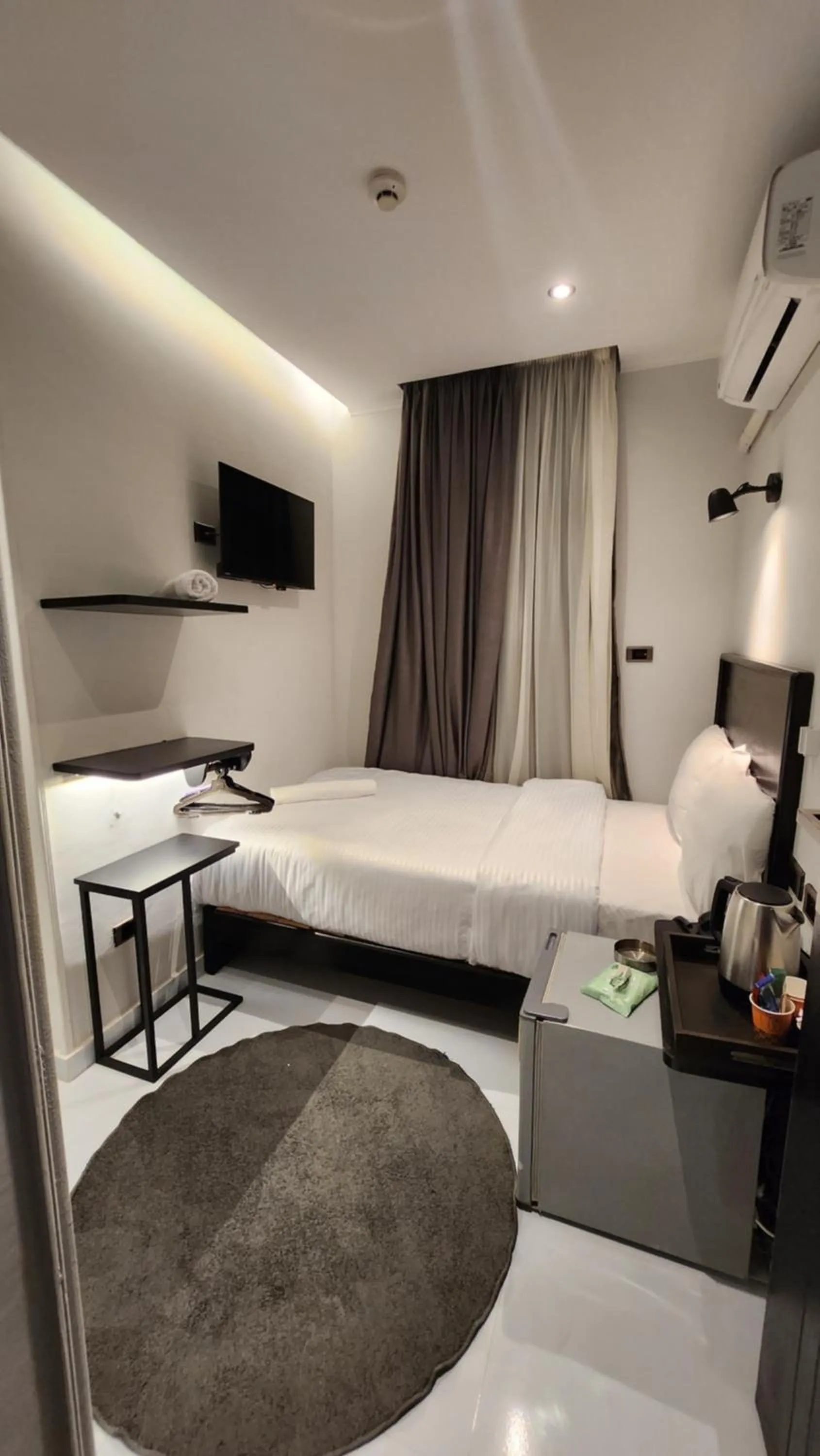 Bed in Helio Cairo Hotel