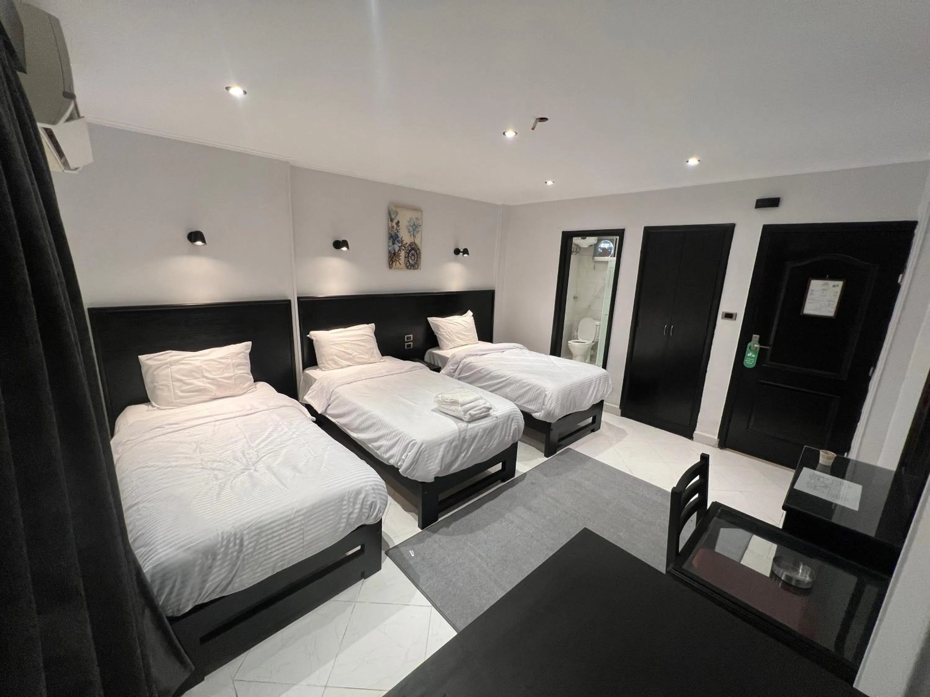 Bed in Helio Cairo Hotel