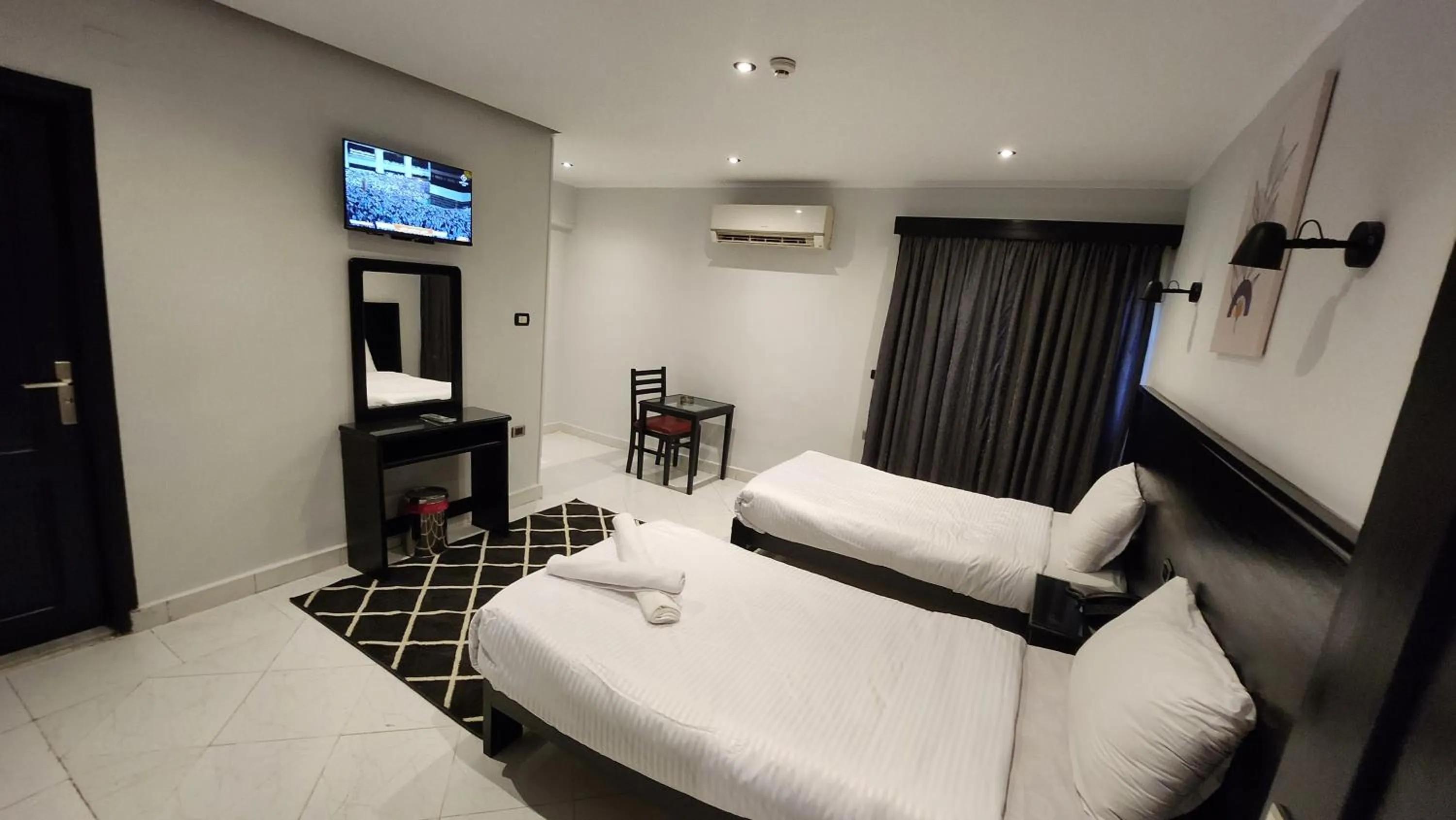 Bed in Helio Cairo Hotel