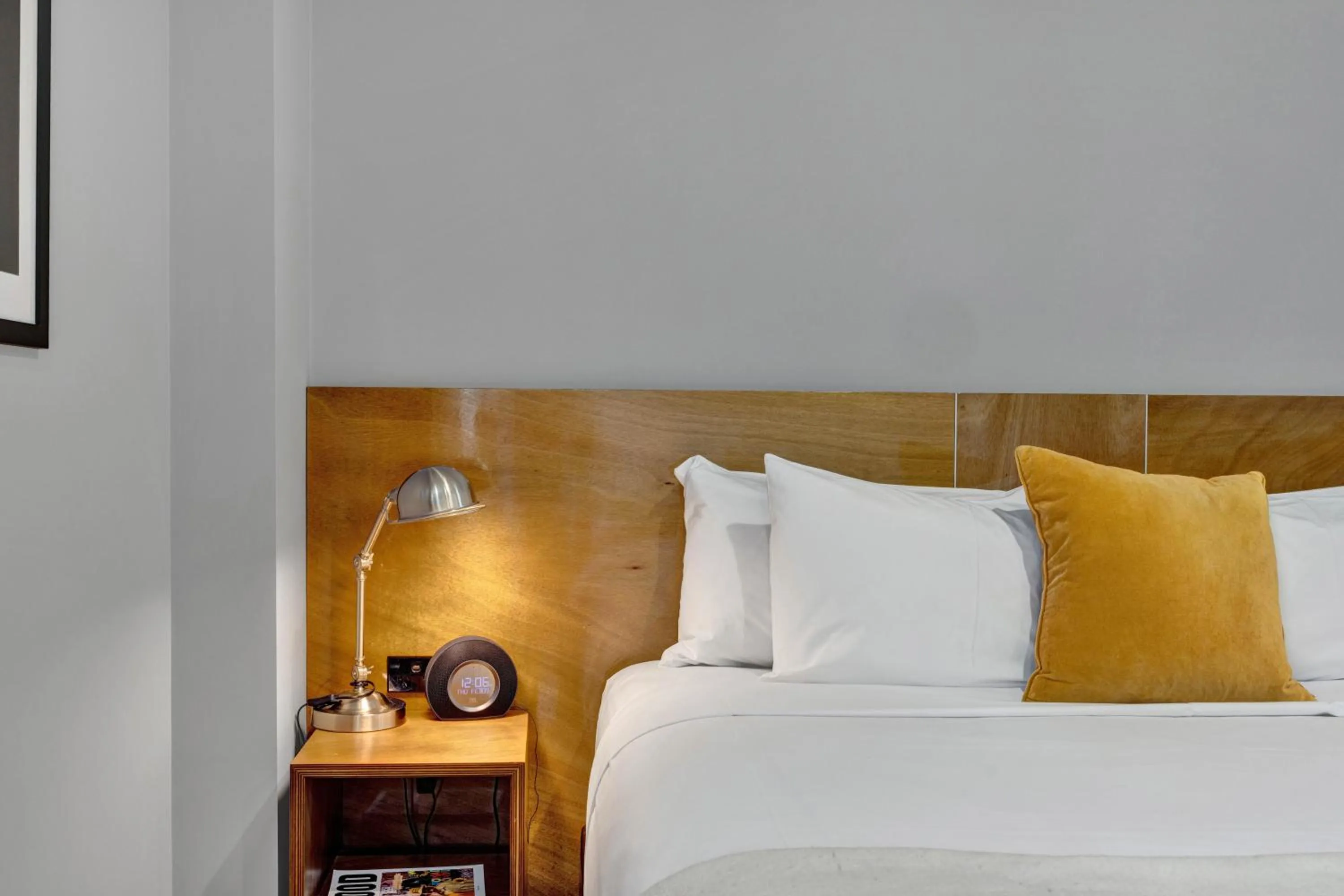 Bed in King and Queen Hotel Suites