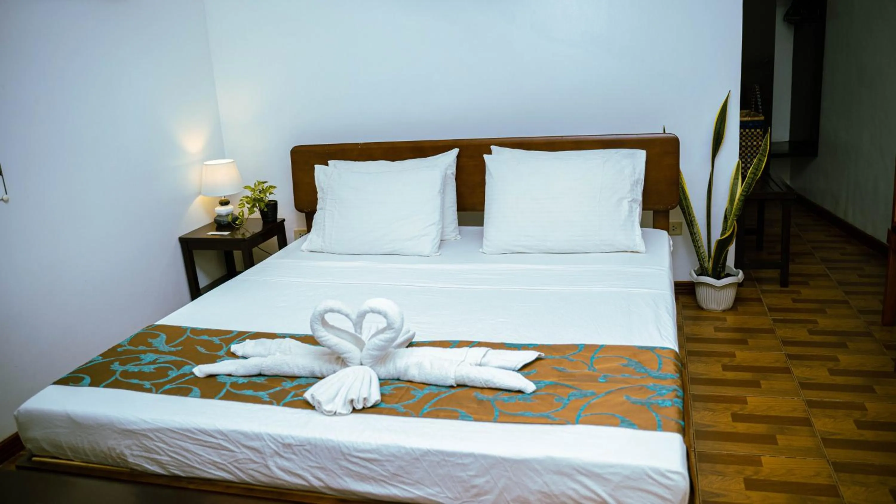 Bed in DiveGurus Boracay Beach Resort