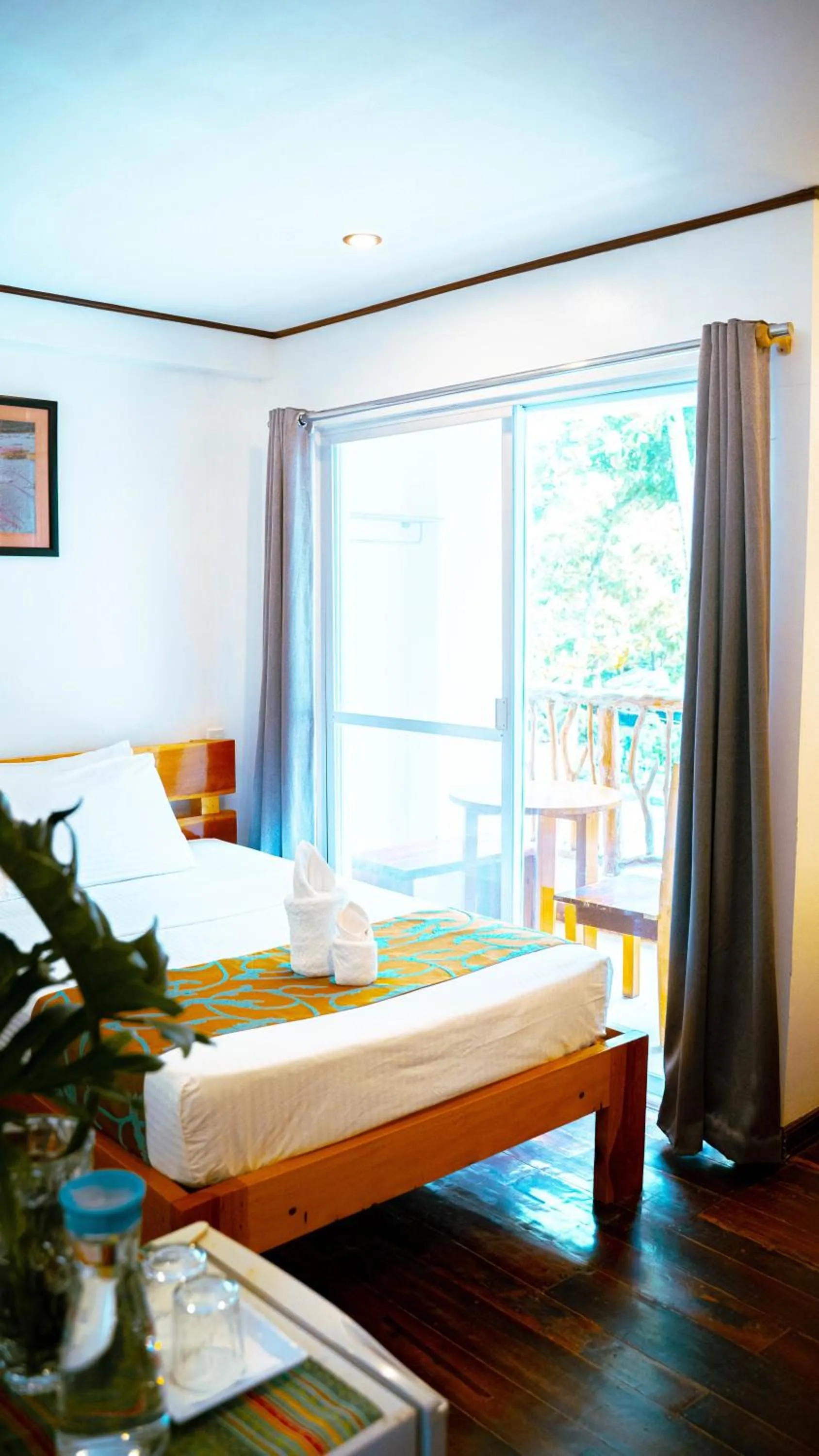 Bed in DiveGurus Boracay Beach Resort